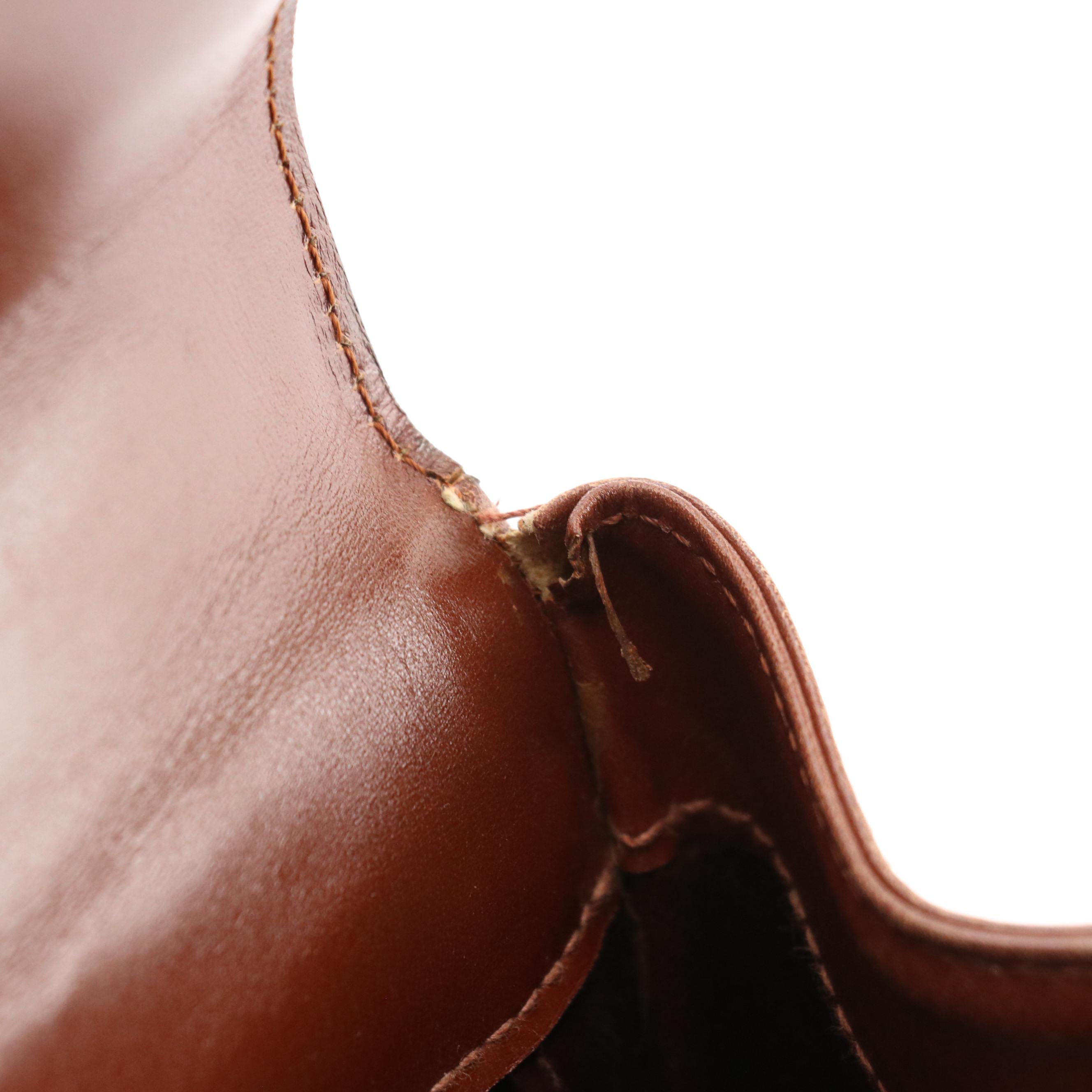 Prada Top Handle Lockable Handbag in Brown Leather