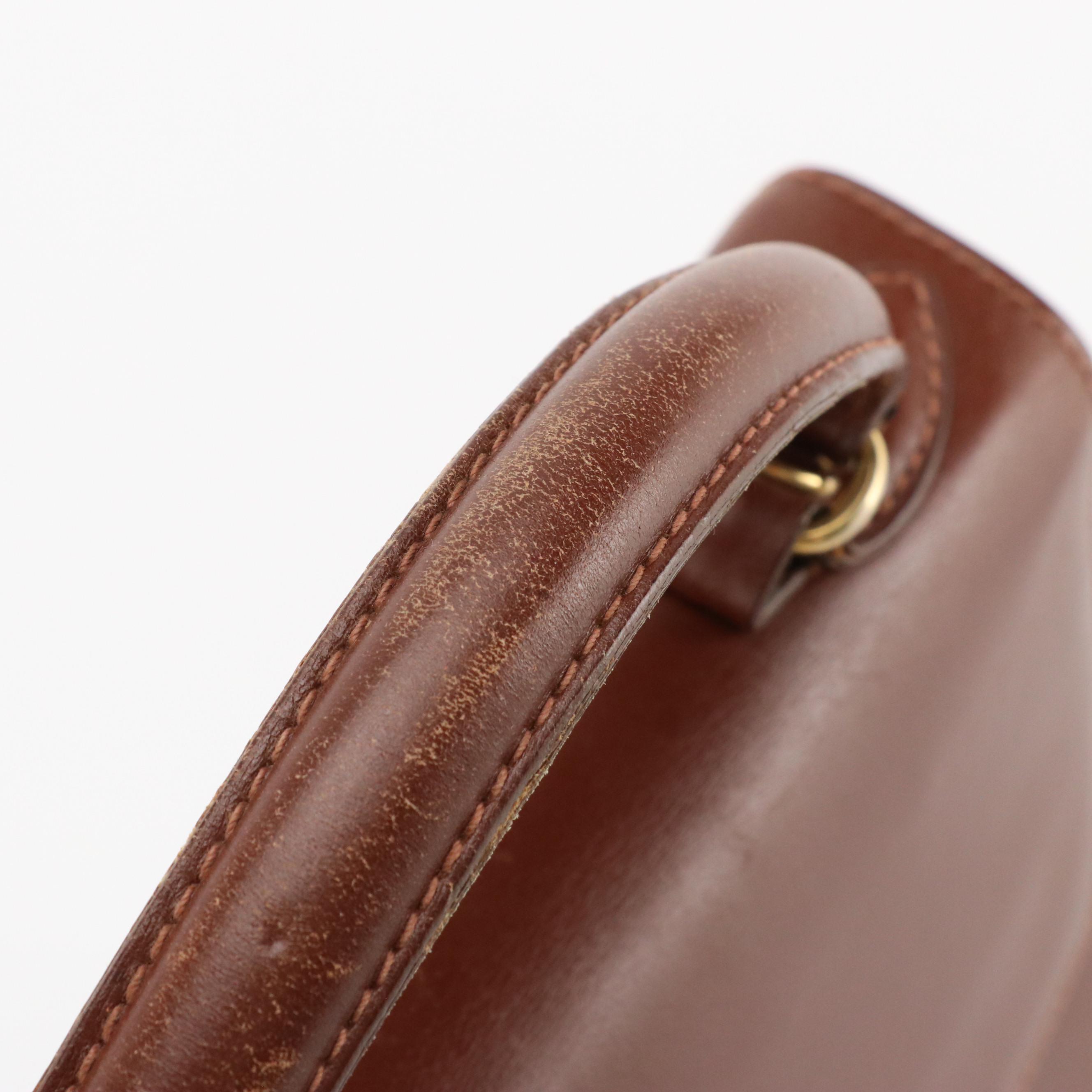 Prada Top Handle Lockable Handbag in Brown Leather