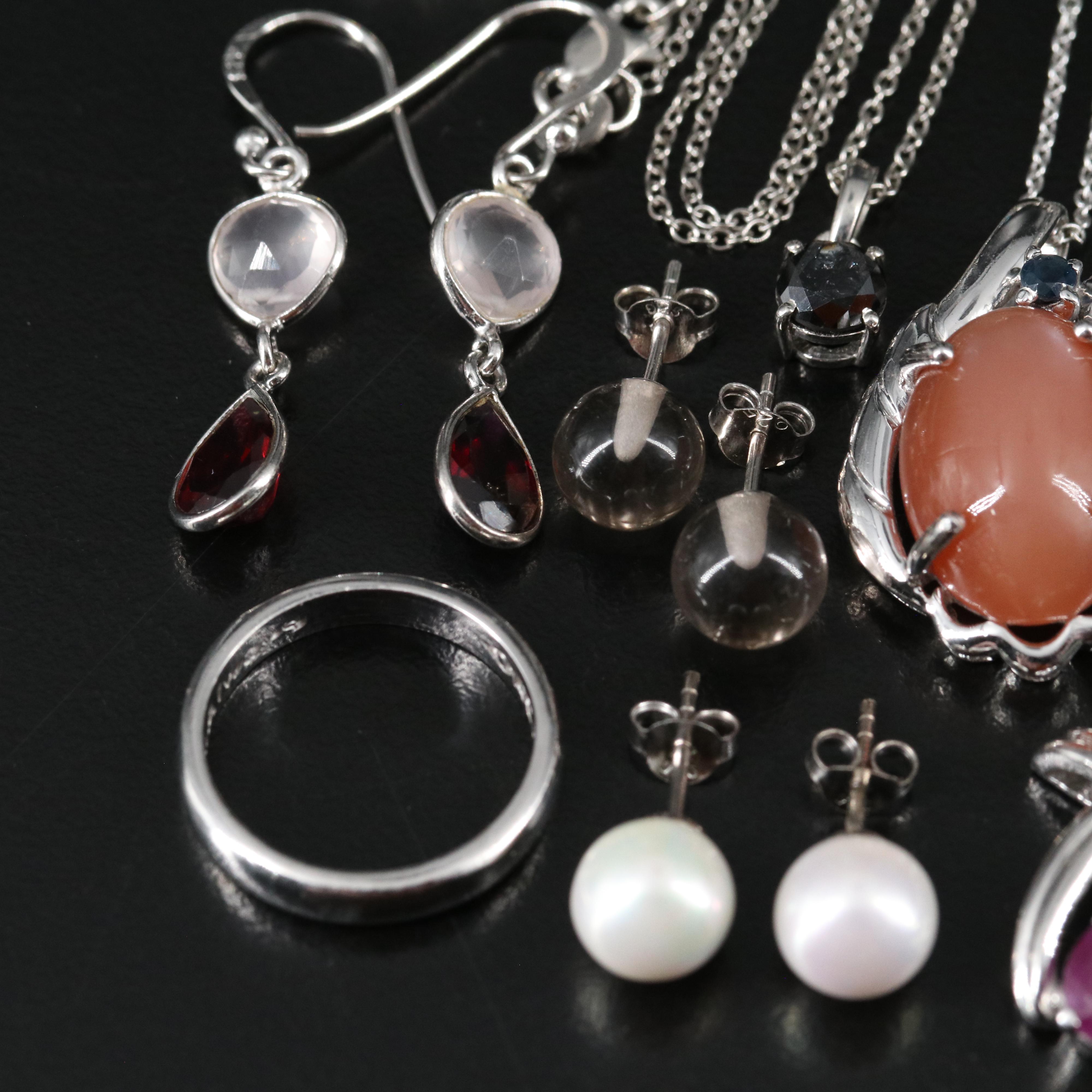 14 Assorted Sterling Silver Rings, Necklaces, Earrings, and Pendants