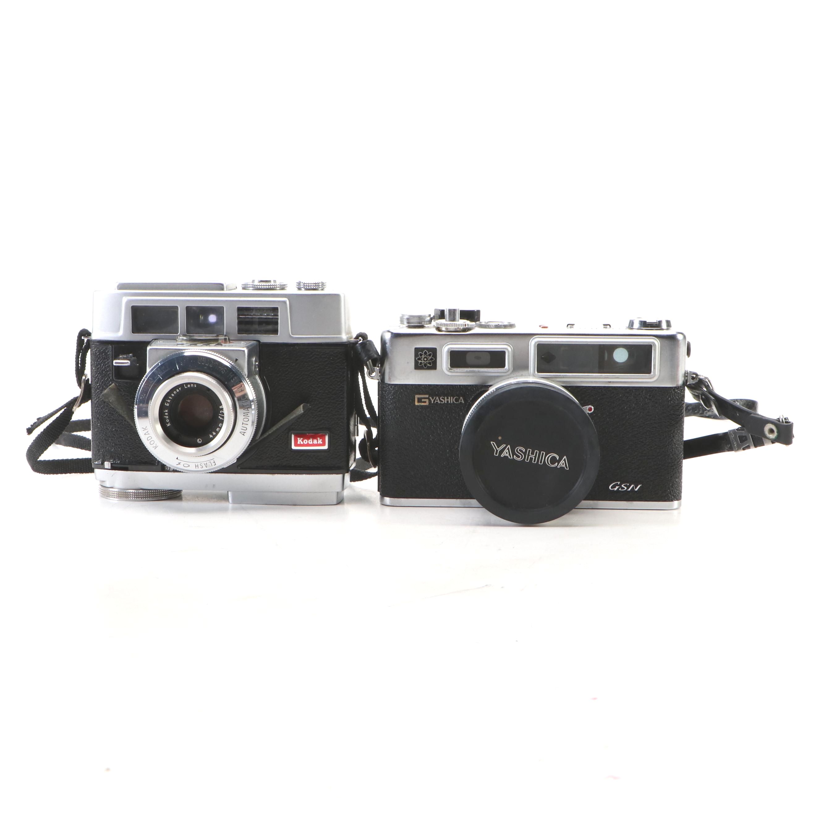 Kodak Motormatic 35F and Yashica Electro 35 with Leather Cases