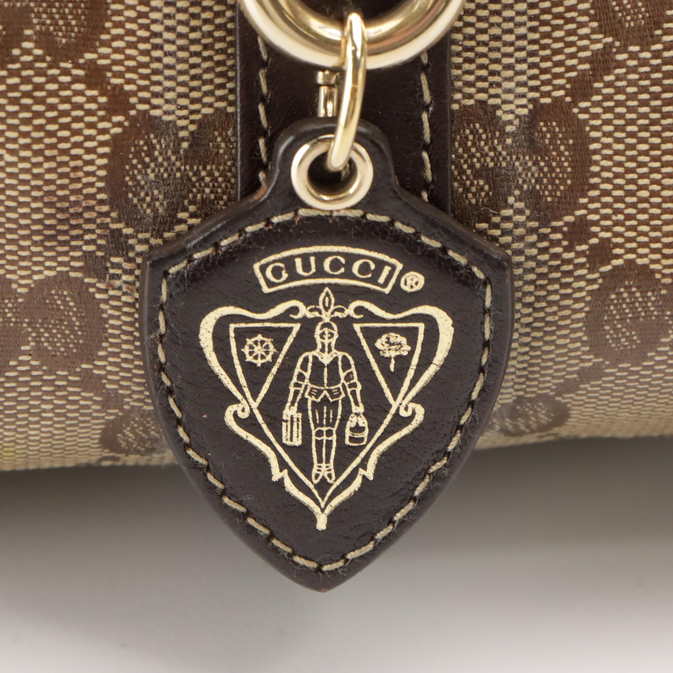 Gucci GG Crystal Canvas Barrel Bag with Brown Leather Trim