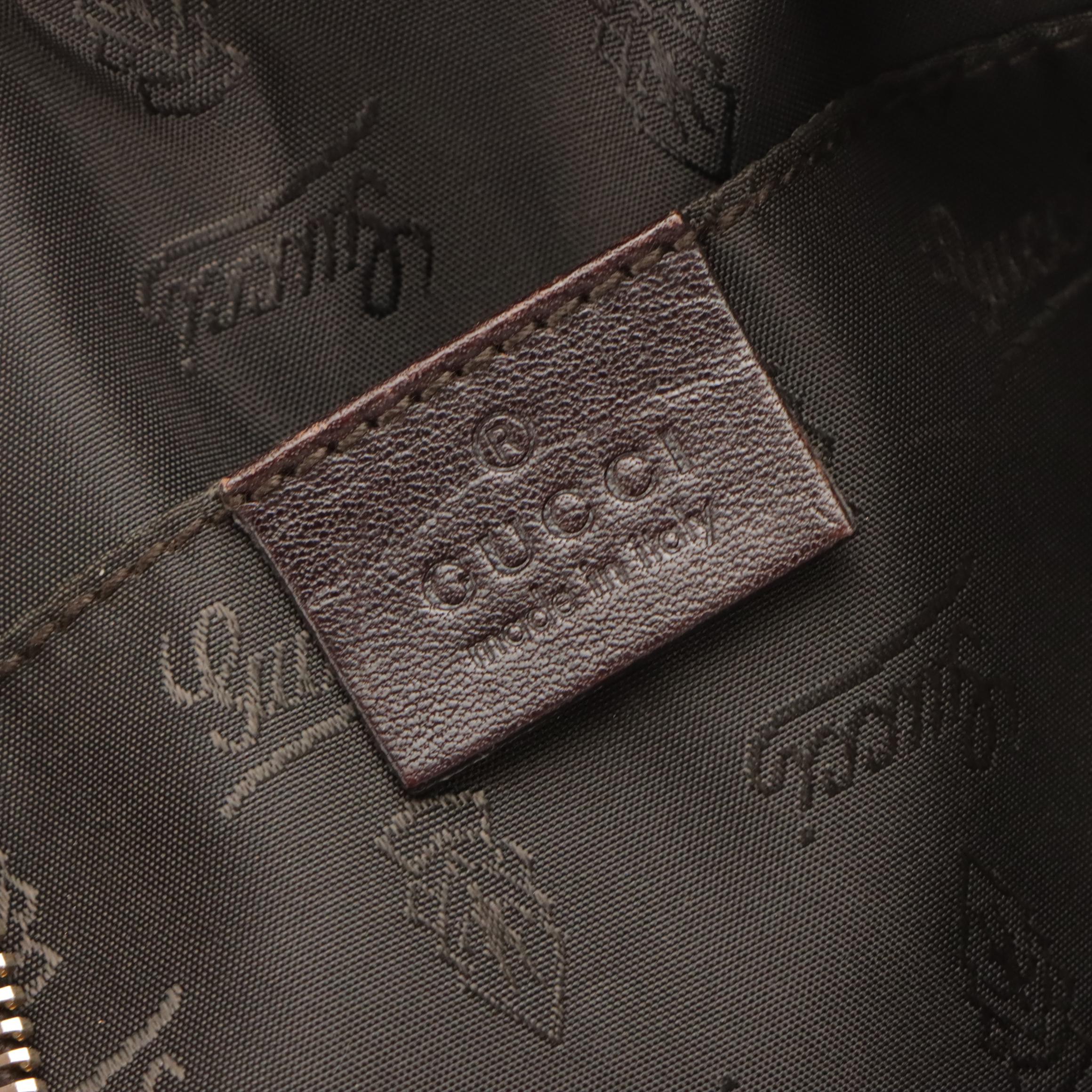 Gucci GG Crystal Canvas Barrel Bag with Brown Leather Trim