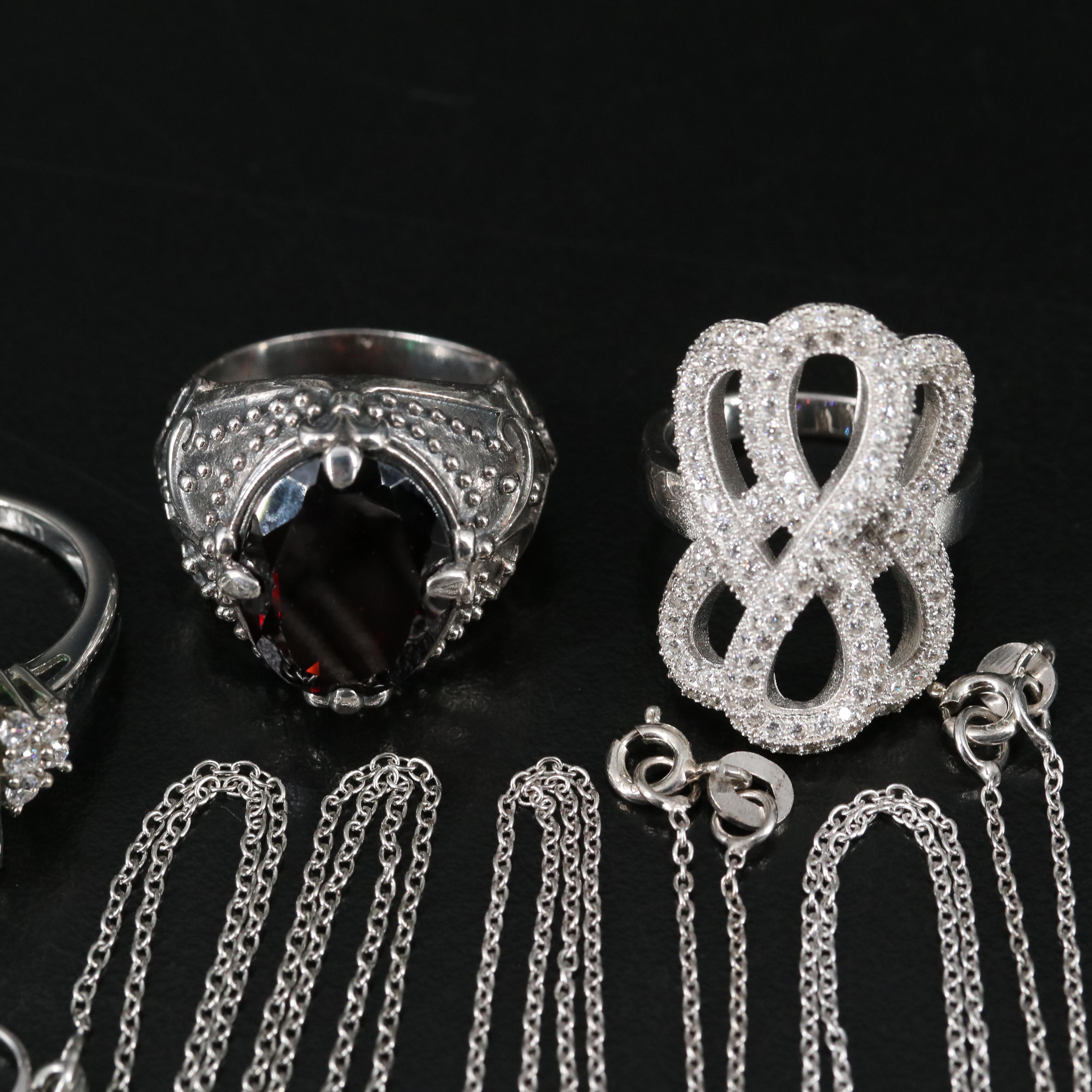 14 Assorted Sterling Silver Rings, Necklaces, Earrings, and Pendants