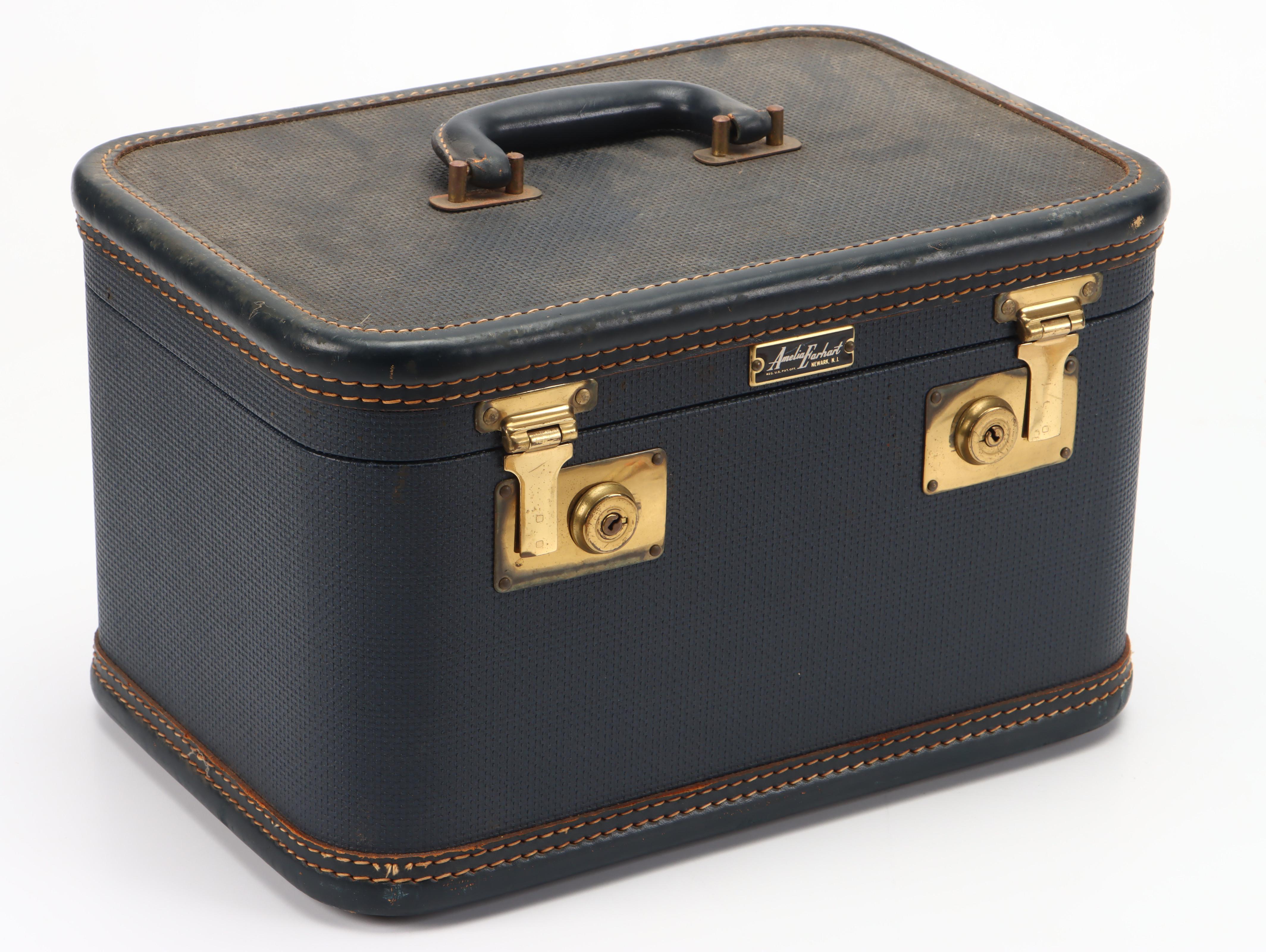 Mattel Barbie and Ken Dolls with Accessories and Amelia Earhart Luggage