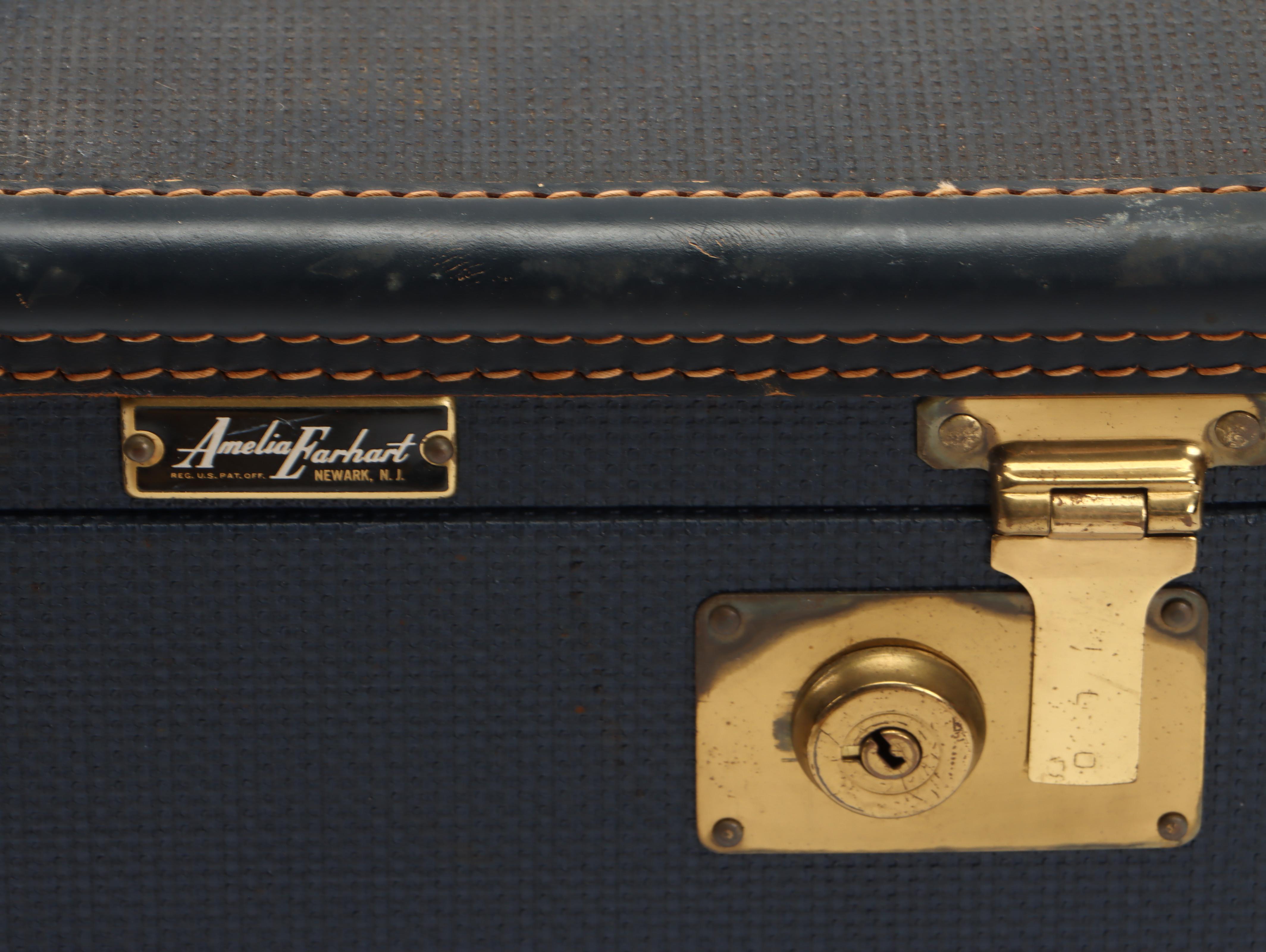 Mattel Barbie and Ken Dolls with Accessories and Amelia Earhart Luggage