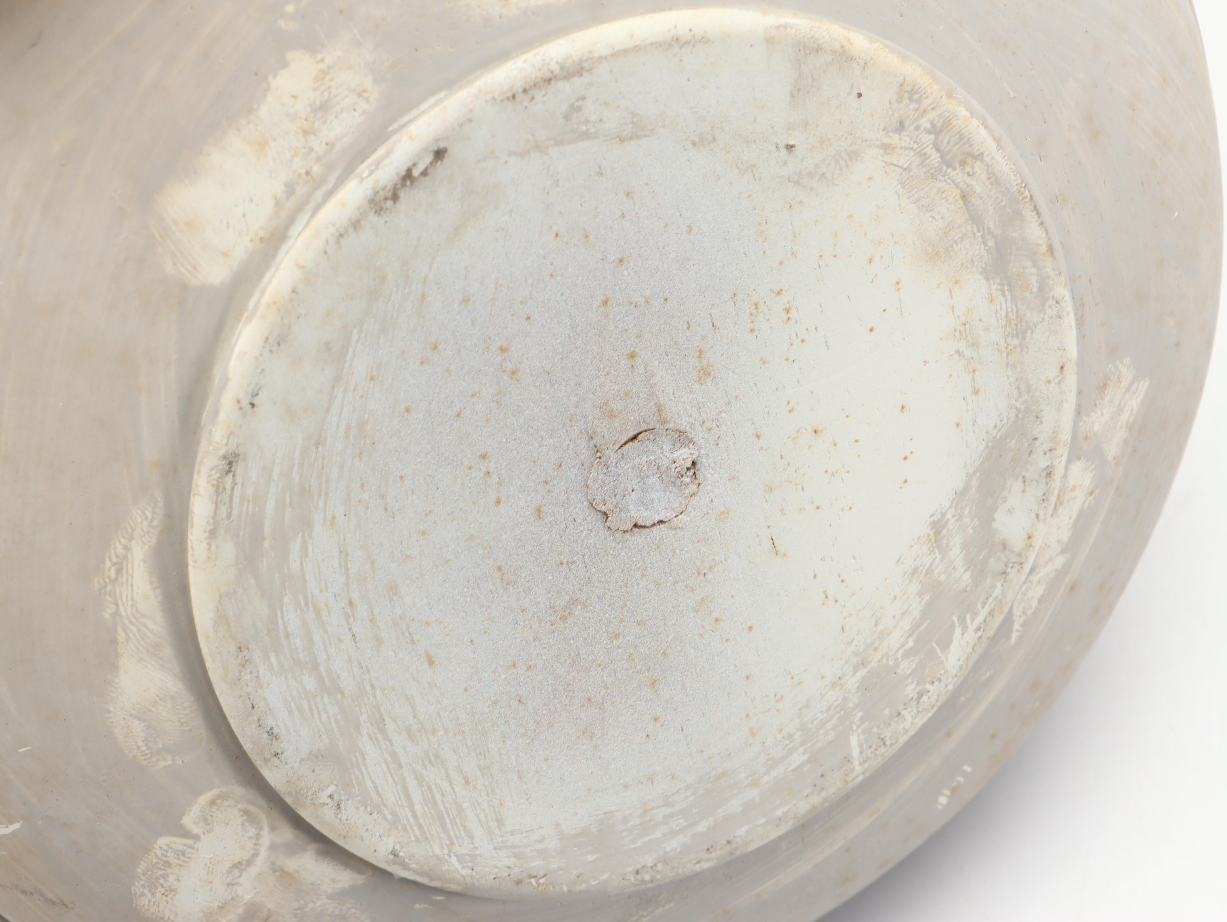 Wooden Banister Finials and End Caps with Wall Hangings and Ceramic Lidded Jars