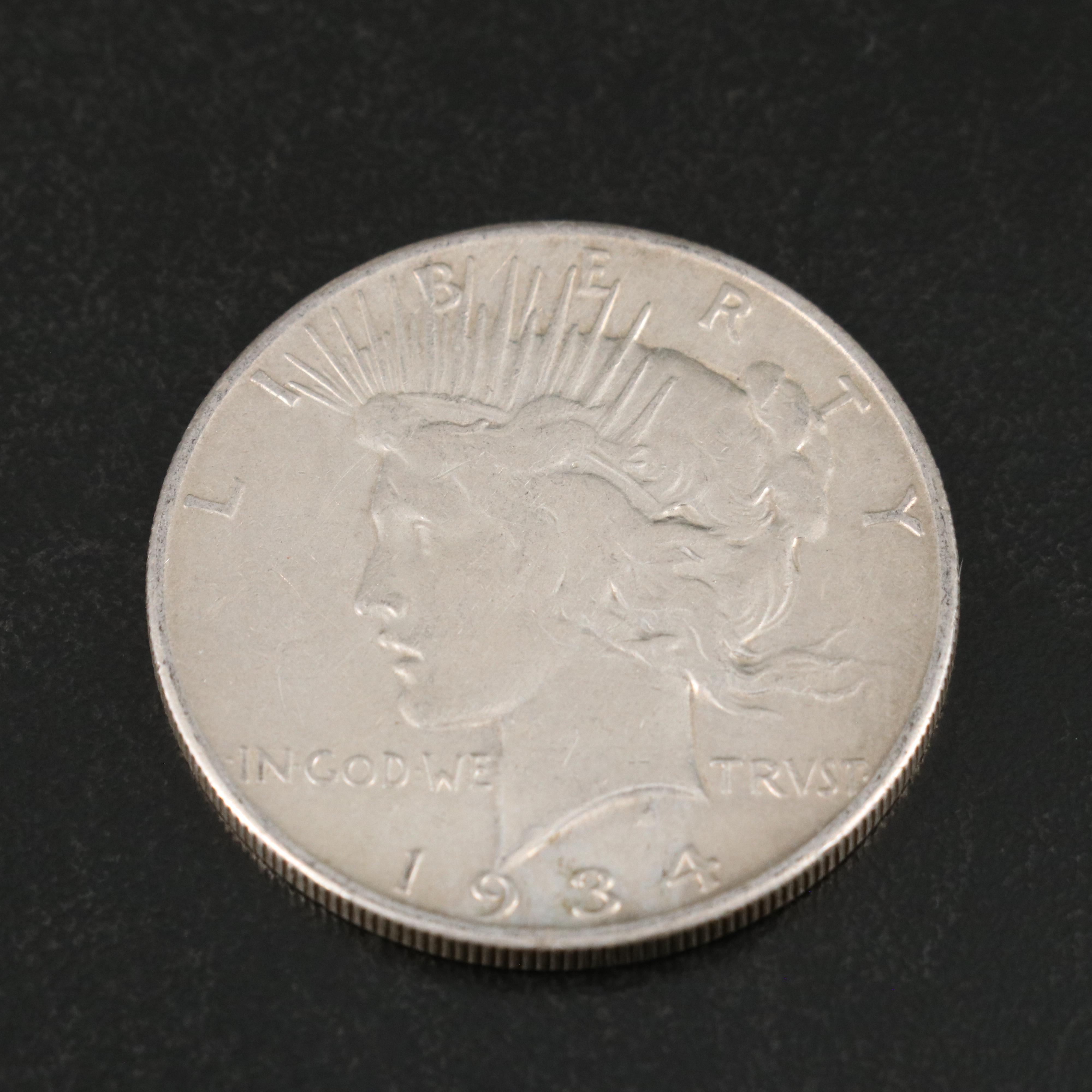 Ten Peace Silver Dollars, Including 1934-S