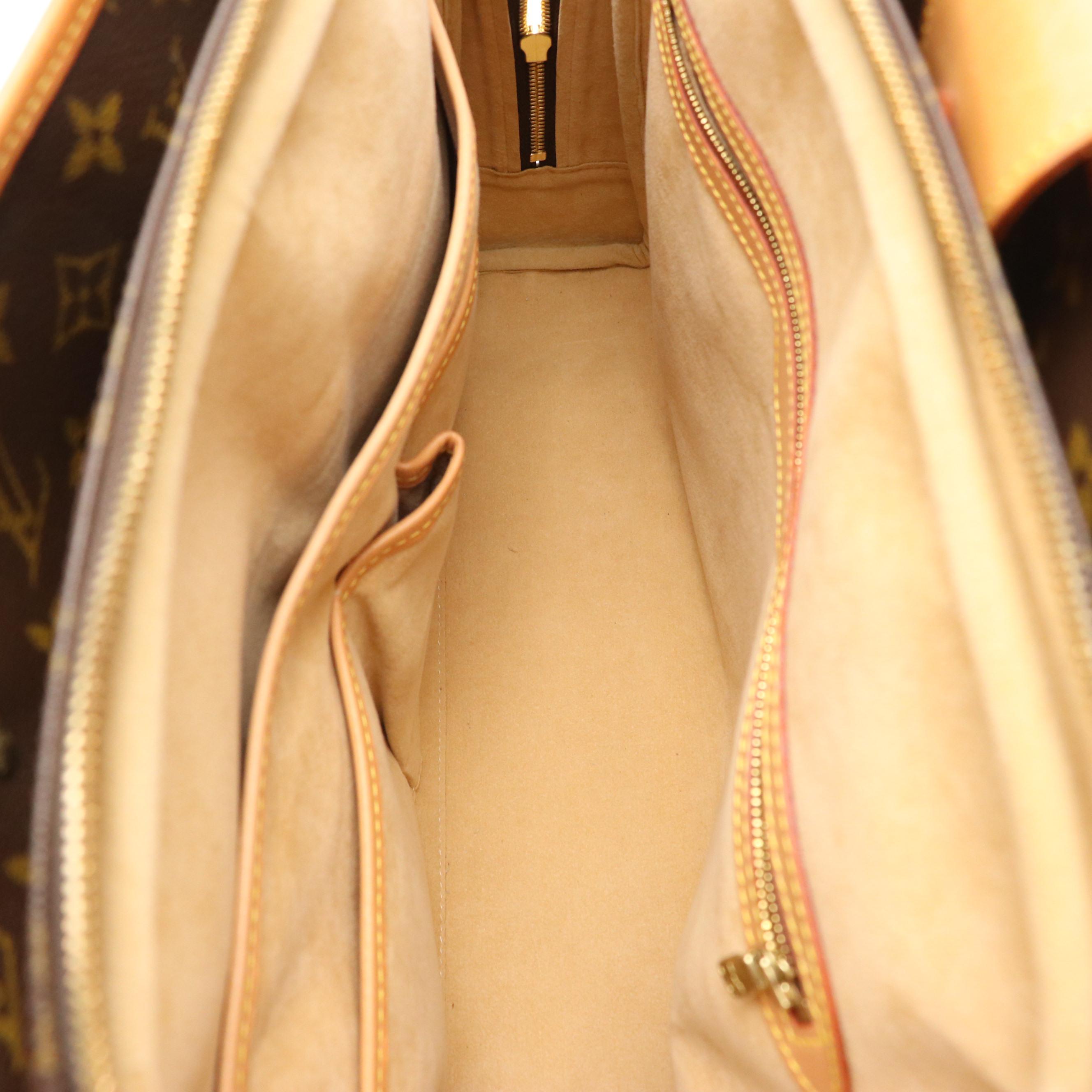 Louis Vuitton Rivoli Business Bag in Monogram Canvas and Vachetta Leather