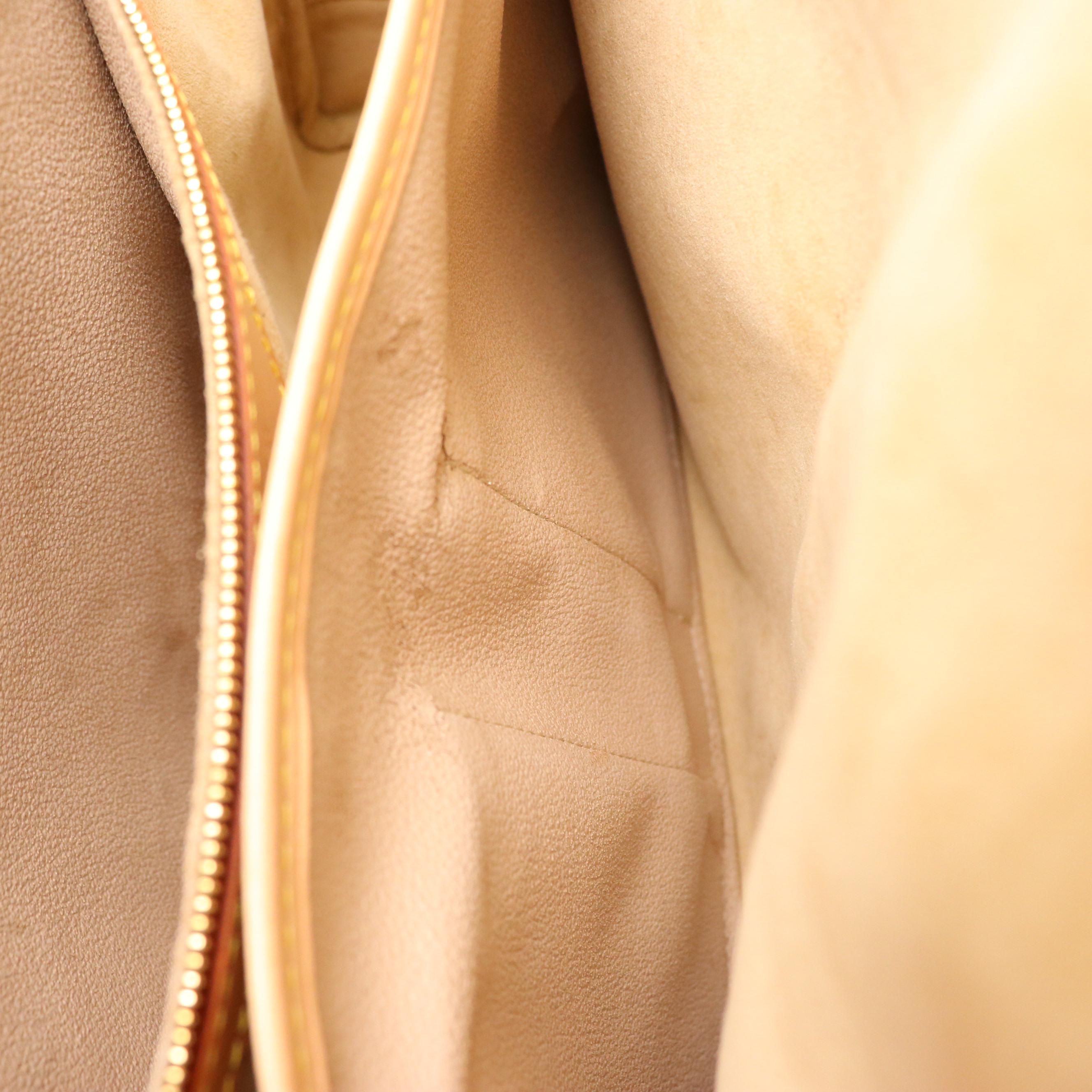 Louis Vuitton Rivoli Business Bag in Monogram Canvas and Vachetta Leather