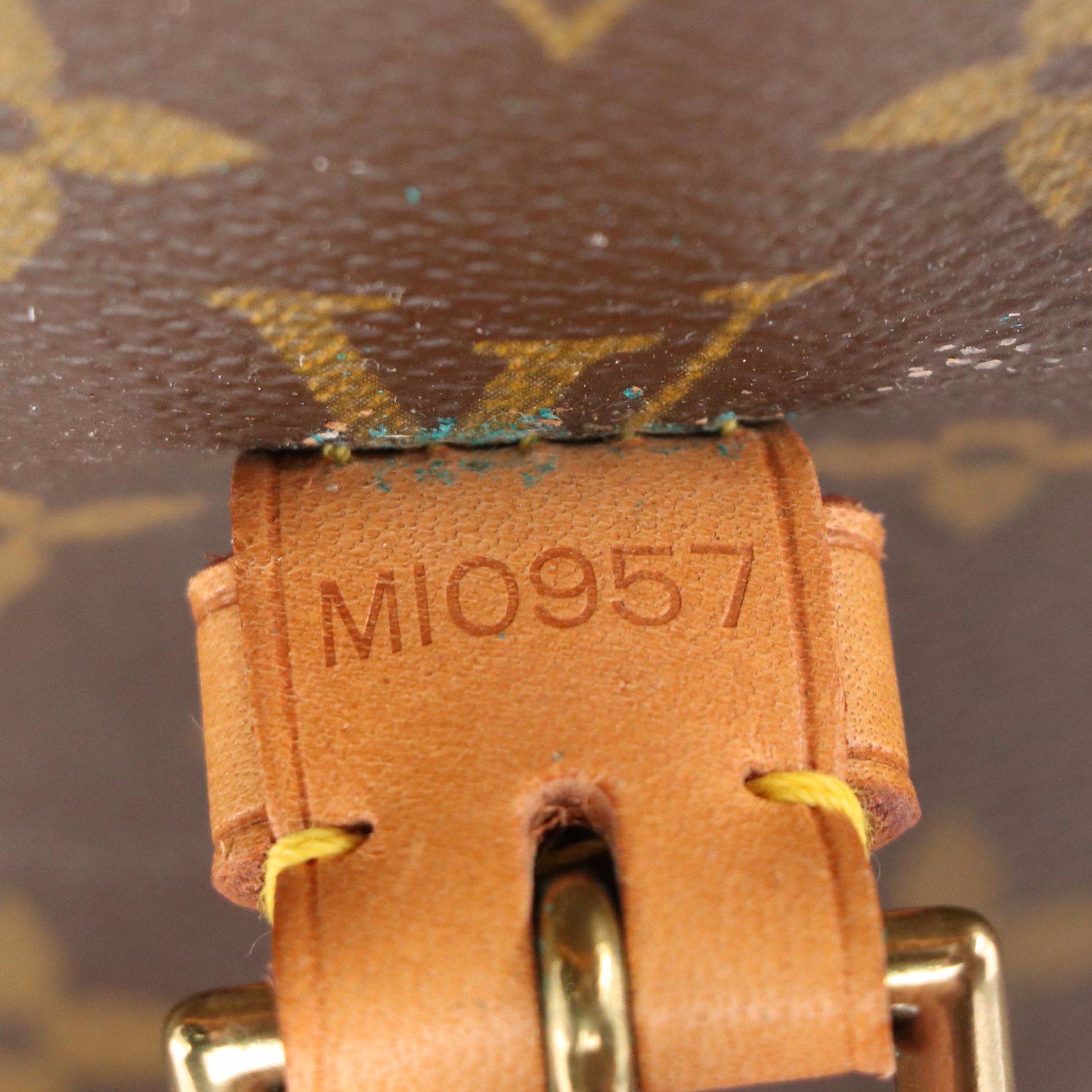 Louis Vuitton Rivoli Business Bag in Monogram Canvas and Vachetta Leather