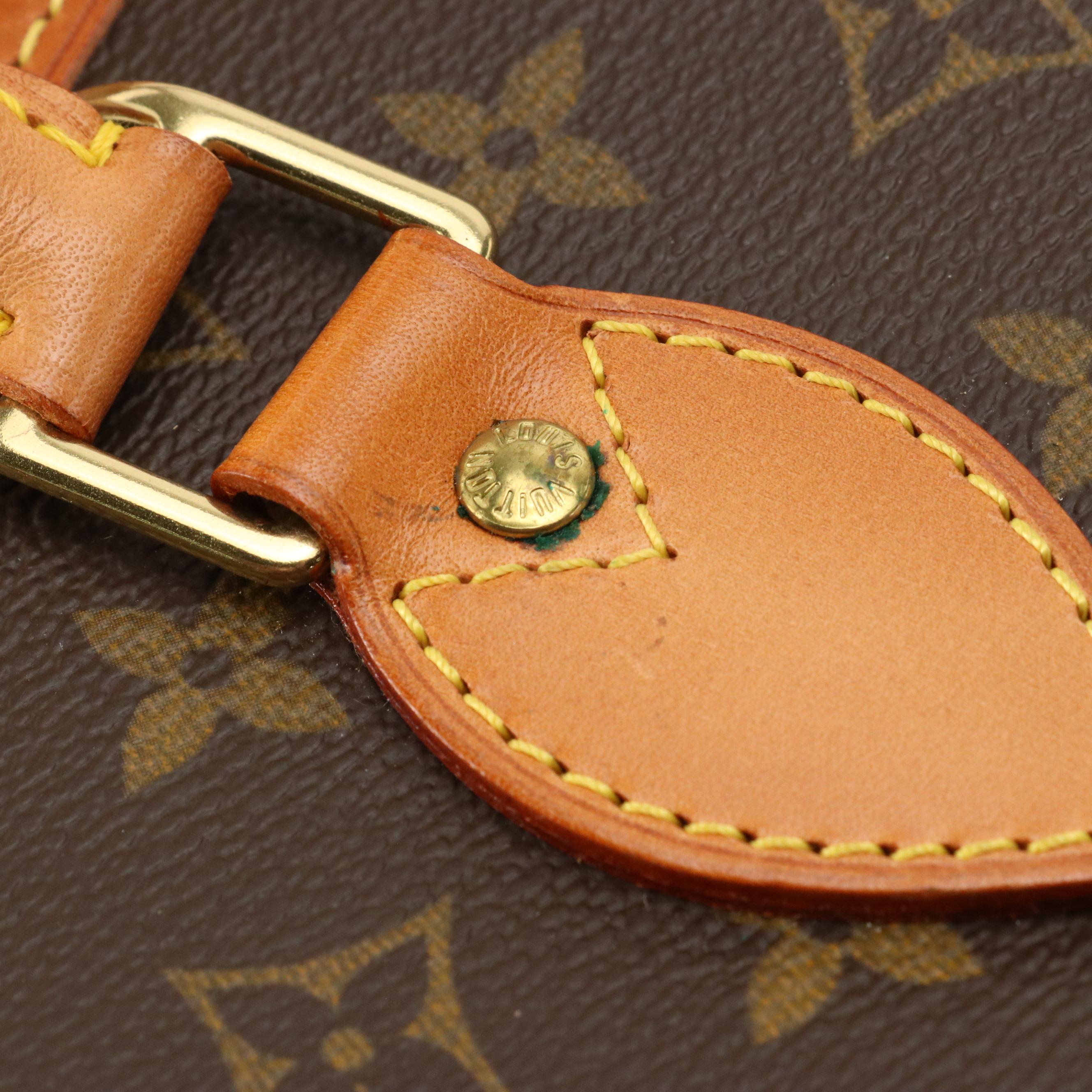 Louis Vuitton Rivoli Business Bag in Monogram Canvas and Vachetta Leather