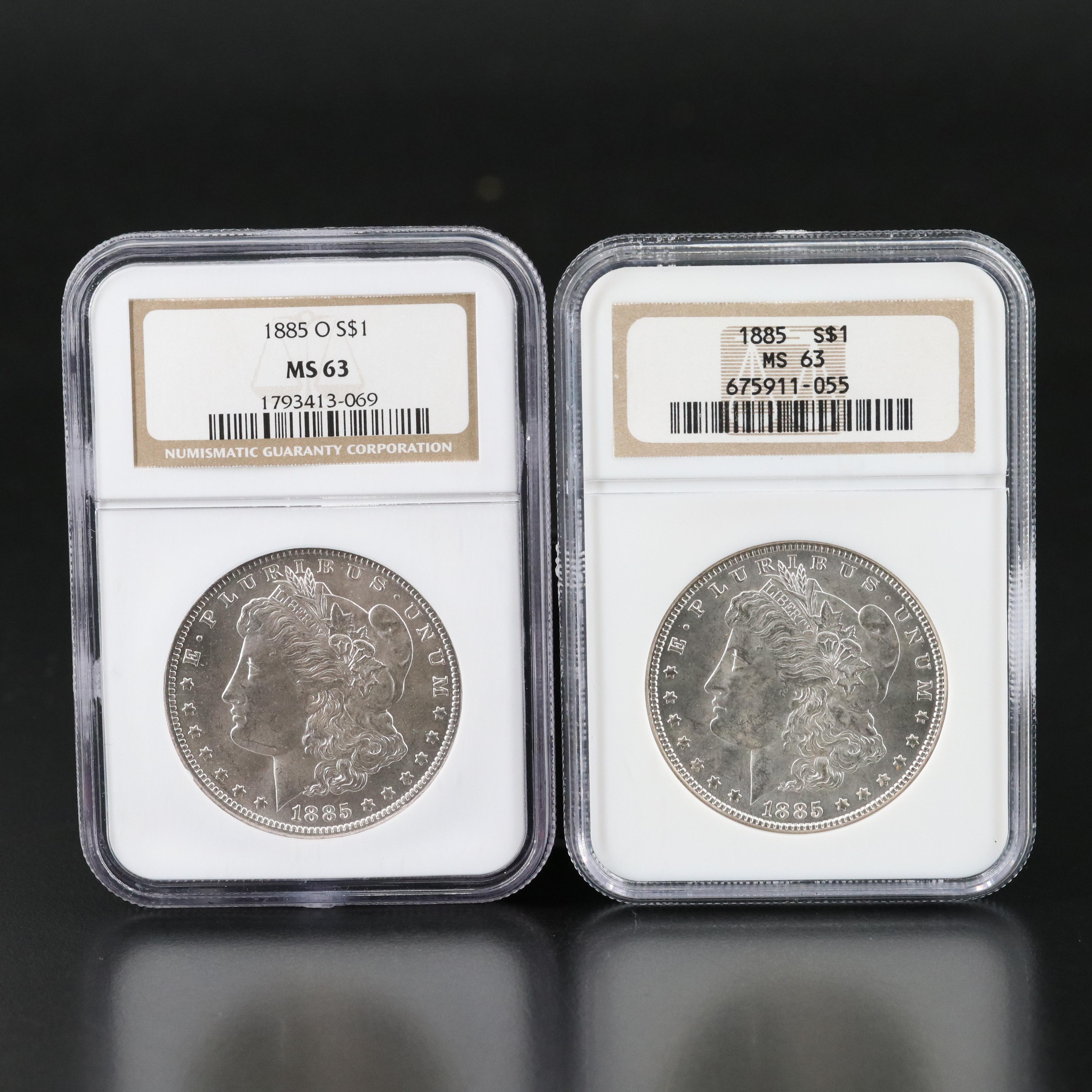 Two NGC Graded MS63 Morgan Silver Dollars, 1885 and 1885-O