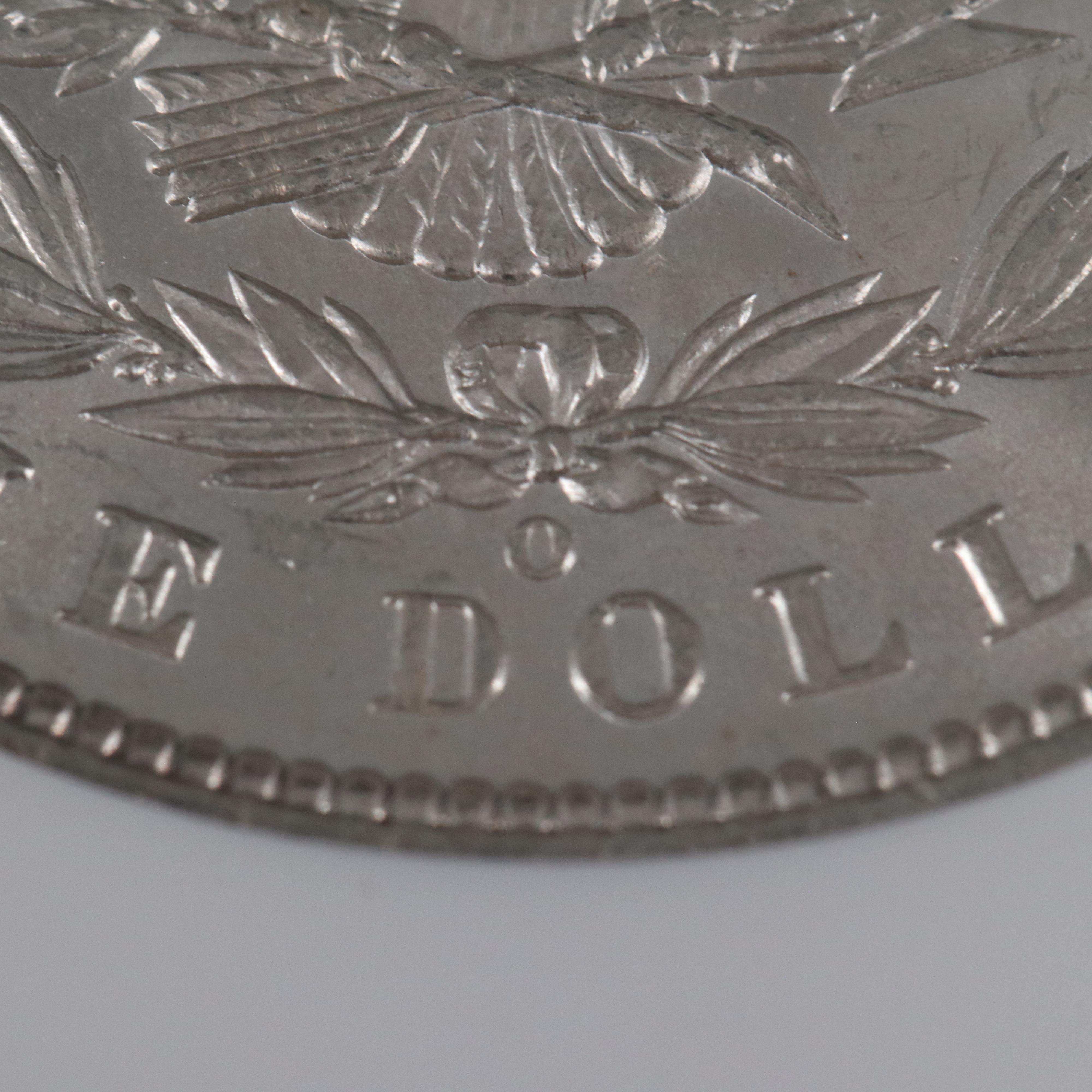 Two NGC Graded MS63 Morgan Silver Dollars, 1885 and 1885-O