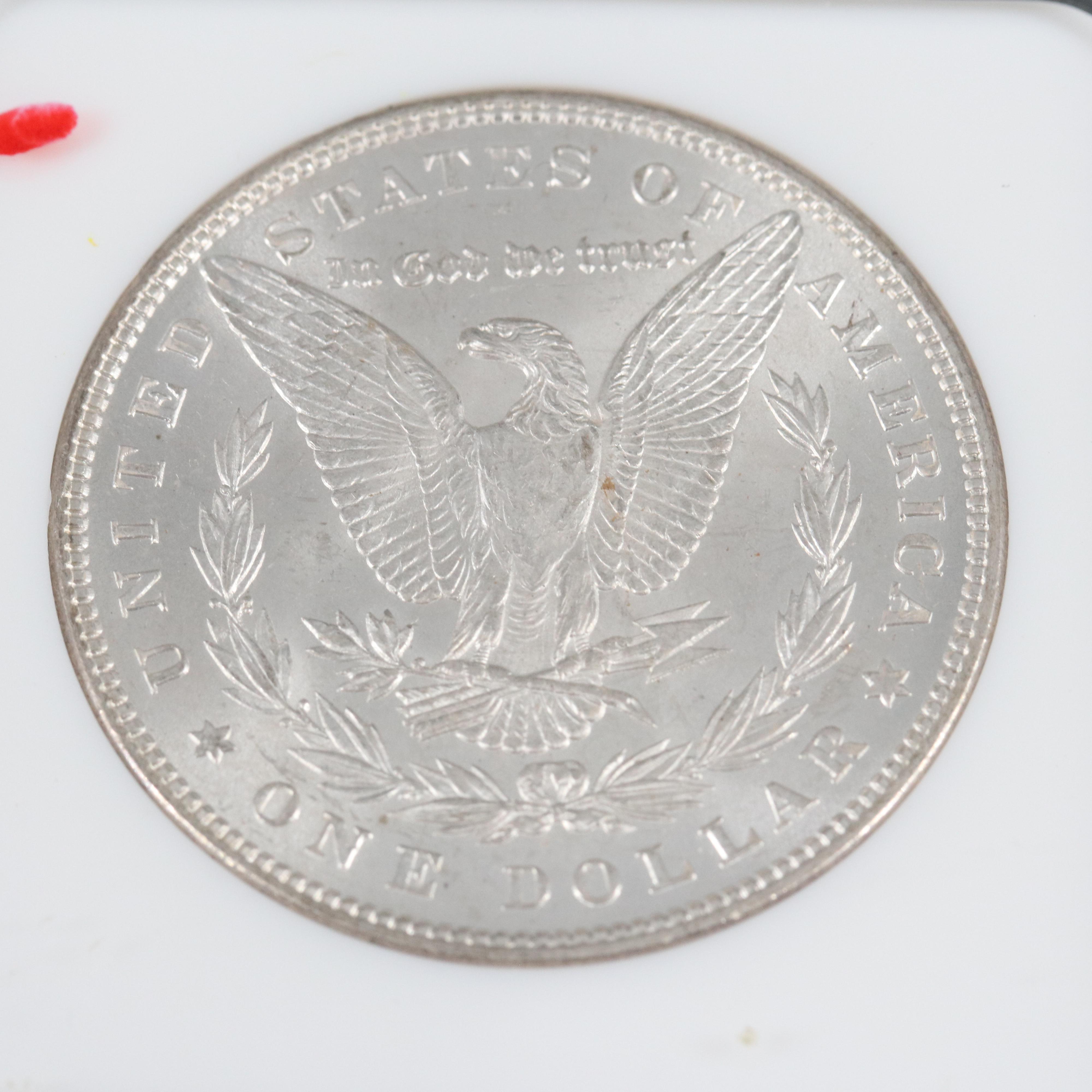 Two NGC Graded MS63 Morgan Silver Dollars, 1885 and 1885-O