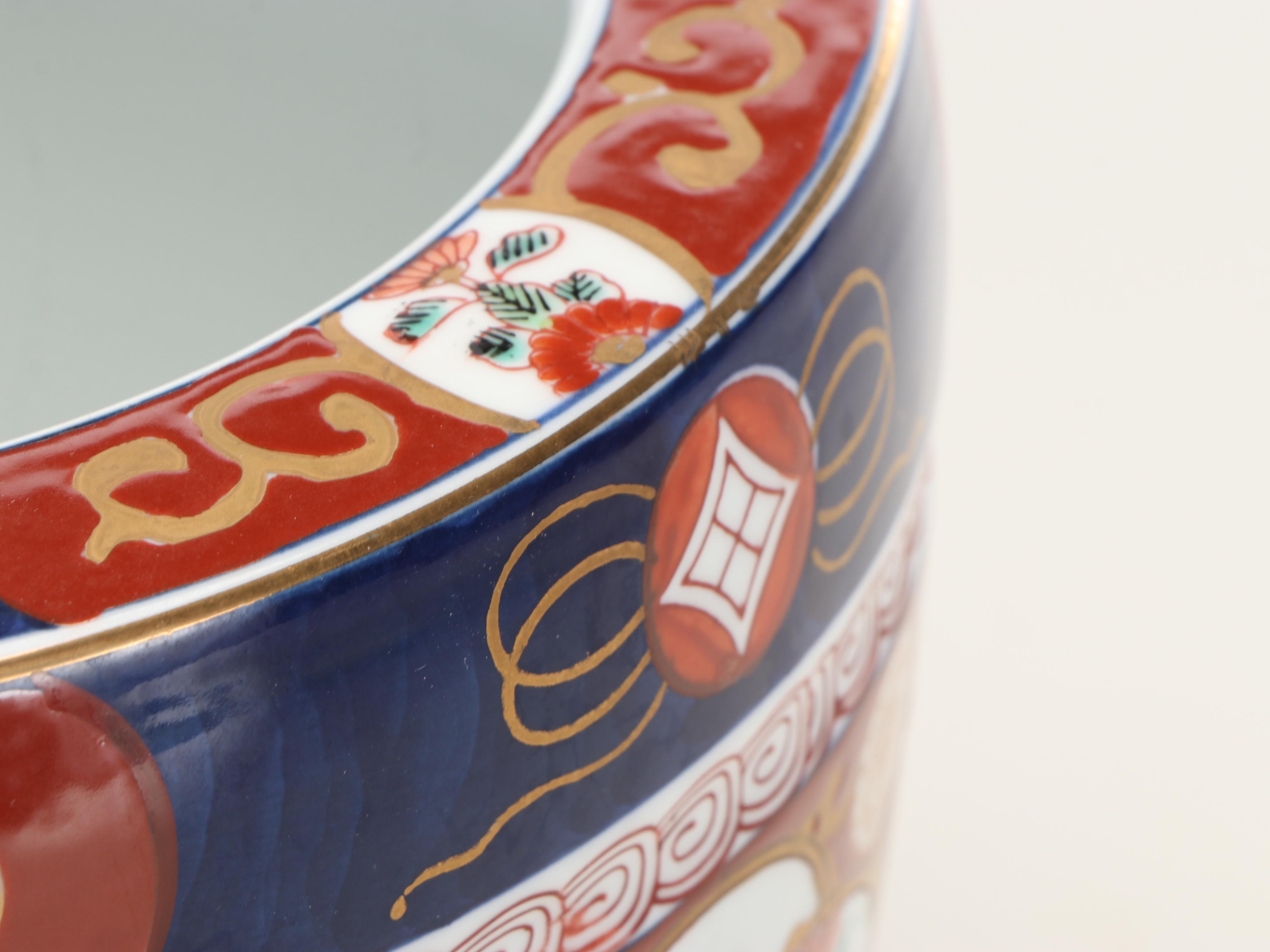 Pair of Japanese Gold Imari Porcelain Fishbowl Planters with Carved Stands