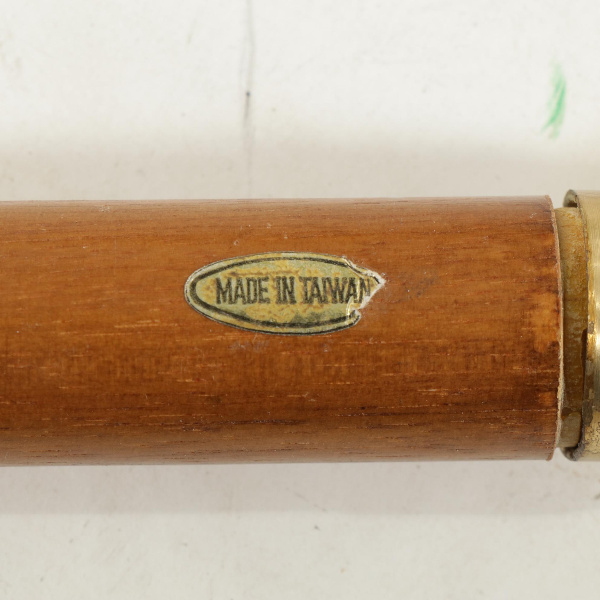 Hidden Compass and Dagger Featured in Cane Quartet of Wood & Brass