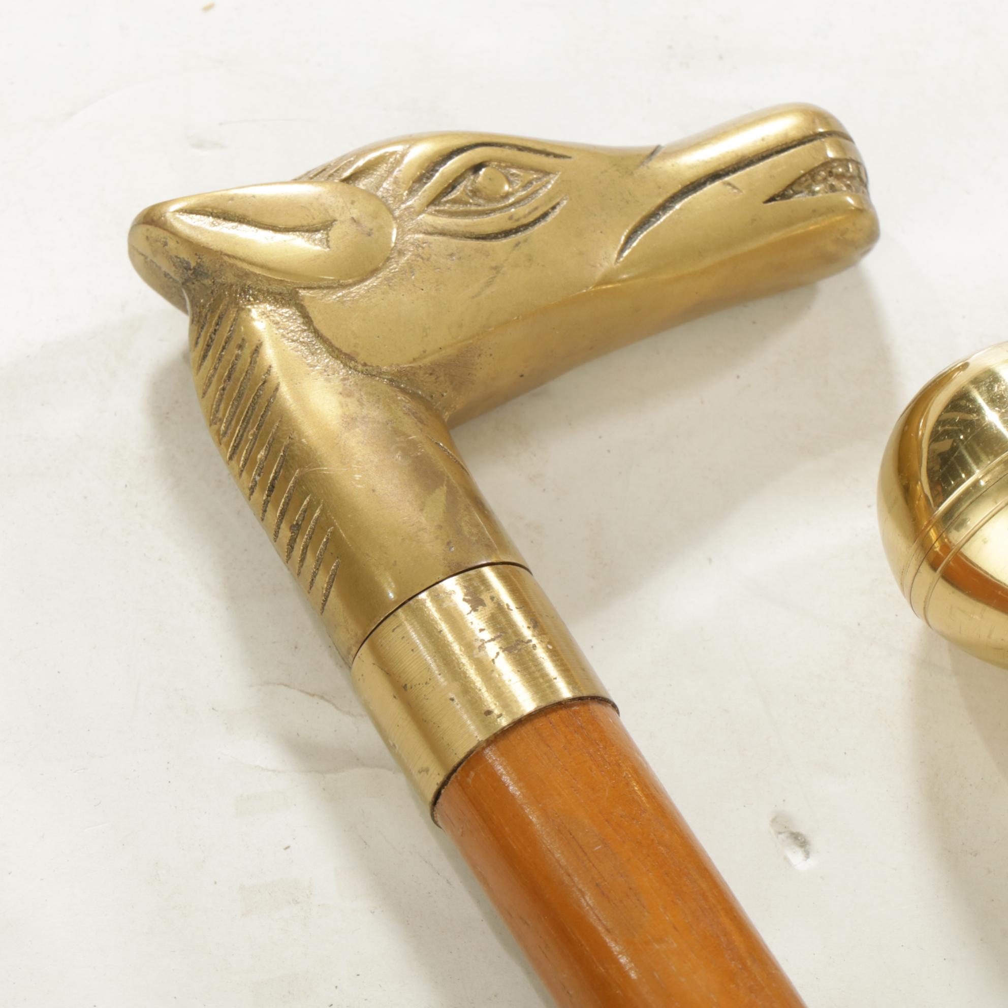 Hidden Compass and Dagger Featured in Cane Quartet of Wood & Brass