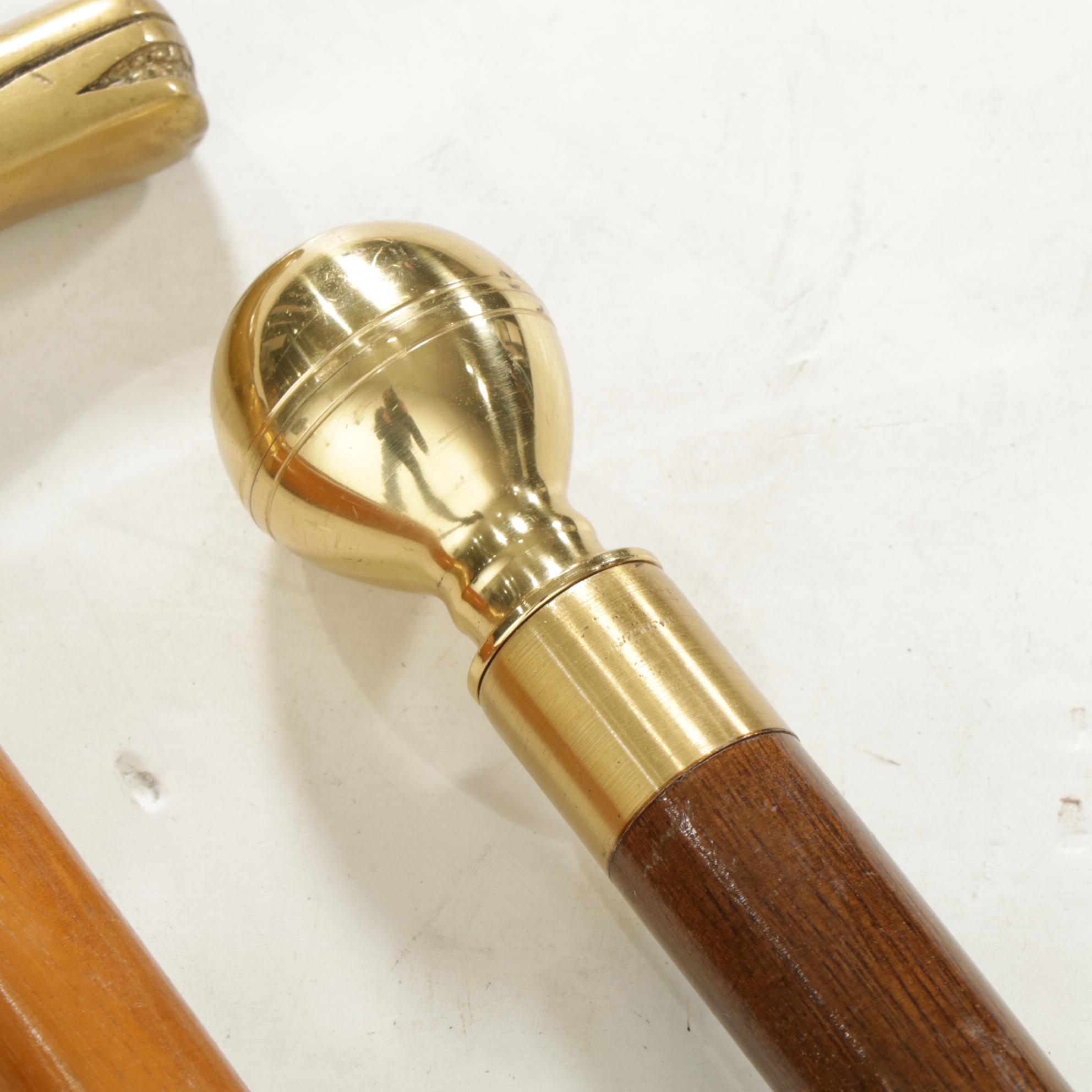 Hidden Compass and Dagger Featured in Cane Quartet of Wood & Brass