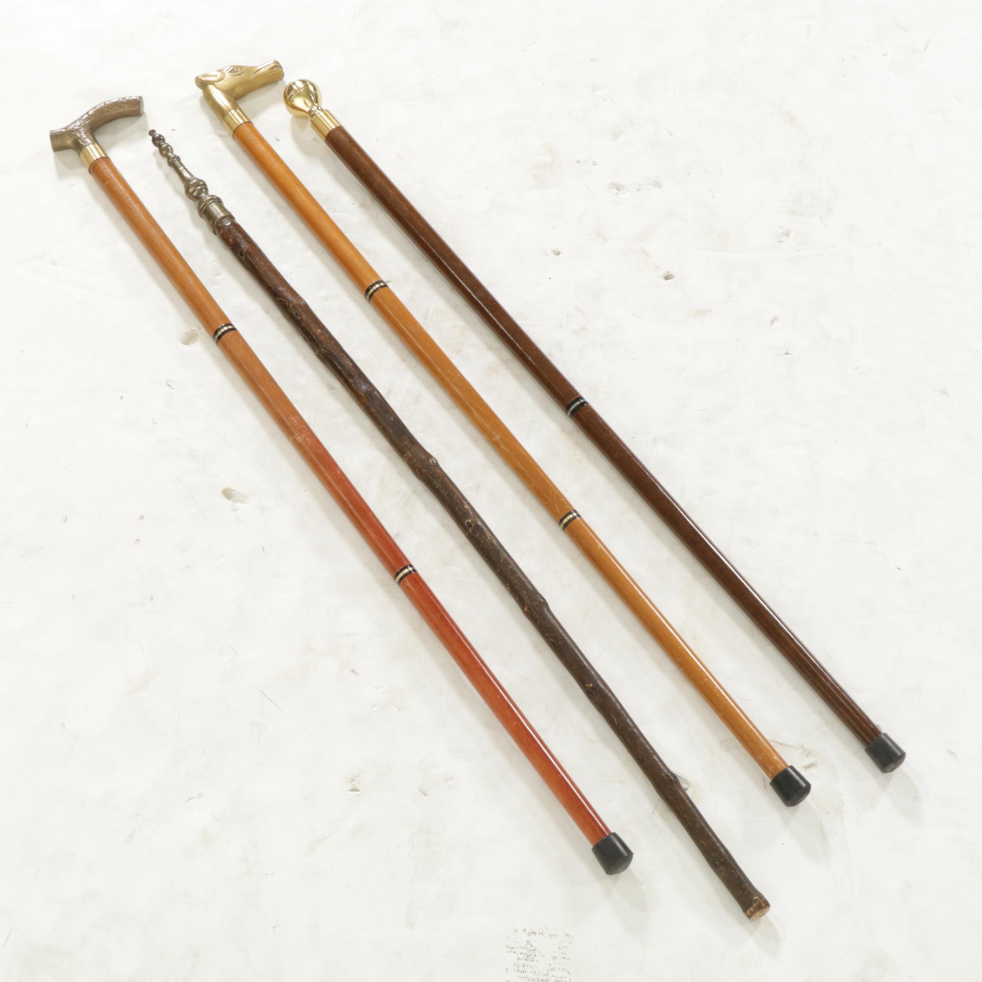 Hidden Compass and Dagger Featured in Cane Quartet of Wood & Brass