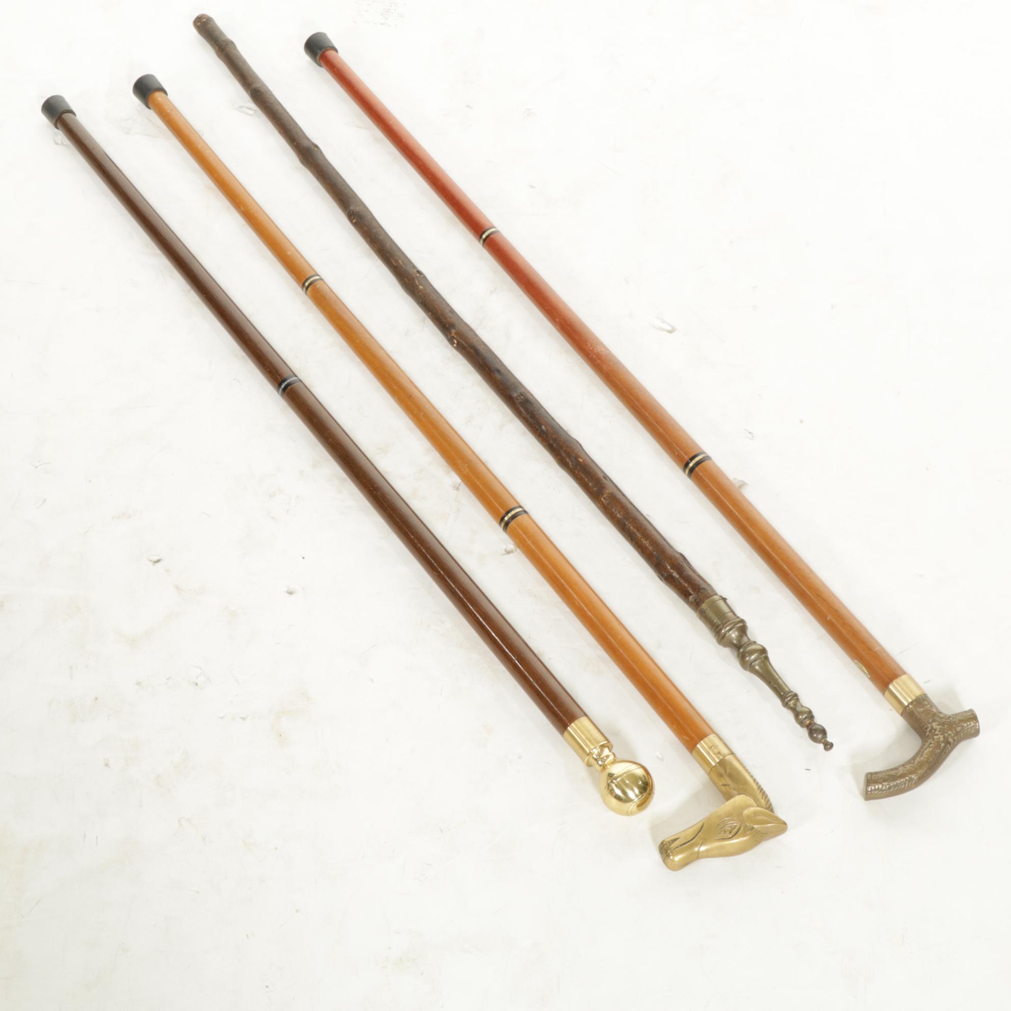 Hidden Compass and Dagger Featured in Cane Quartet of Wood & Brass