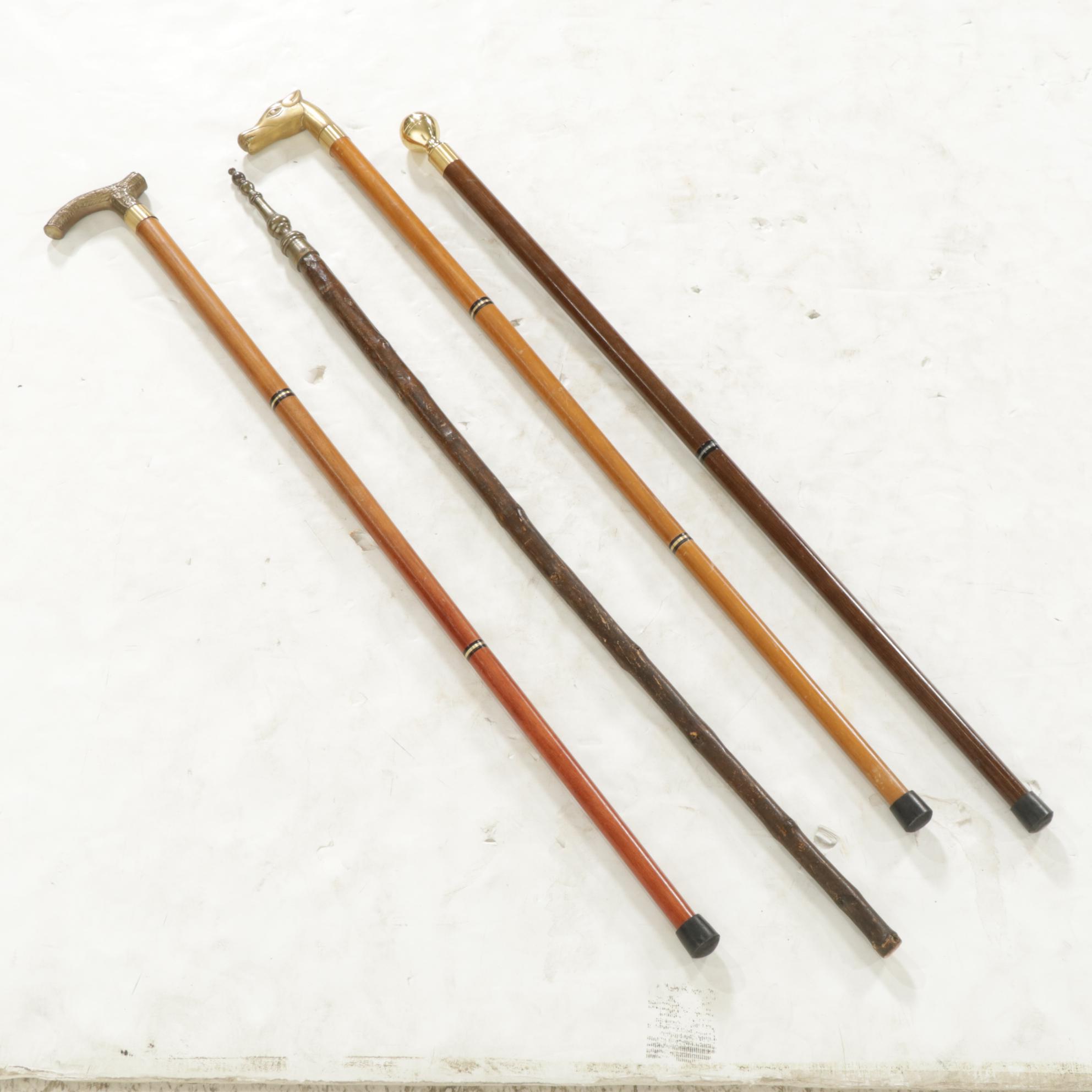 Hidden Compass and Dagger Featured in Cane Quartet of Wood & Brass