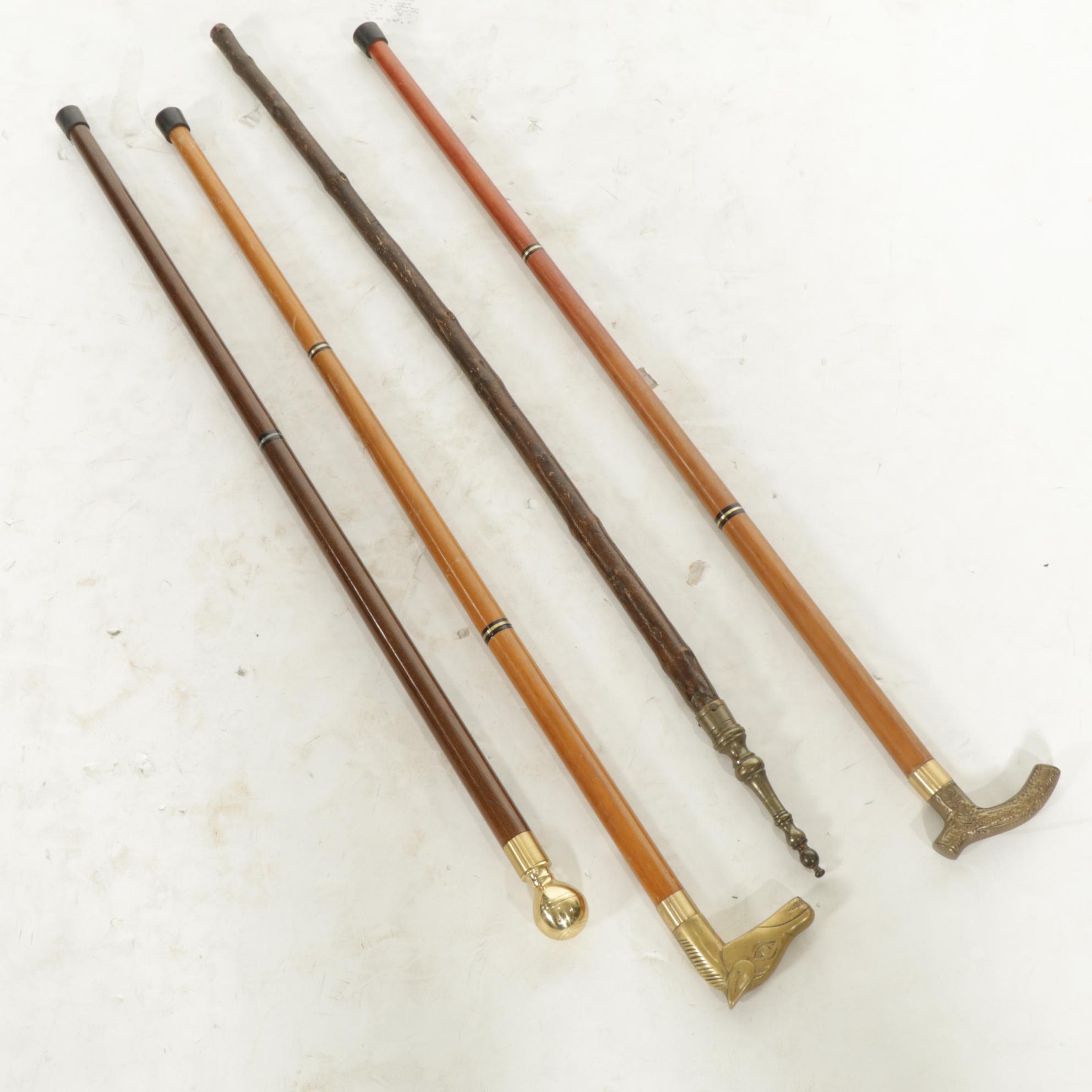 Hidden Compass and Dagger Featured in Cane Quartet of Wood & Brass