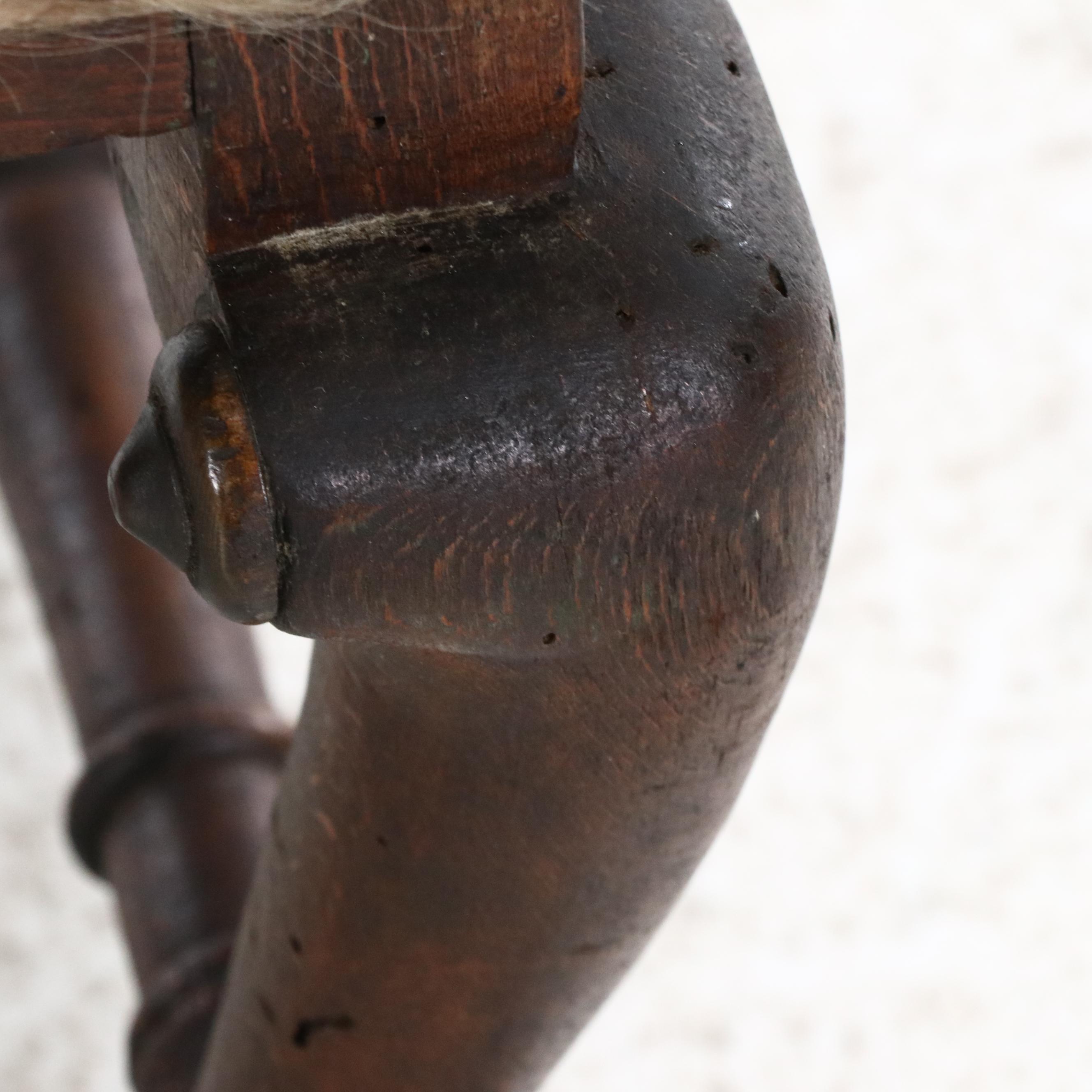 Pair of Cowhide Upholstered Carved Wood Footstools