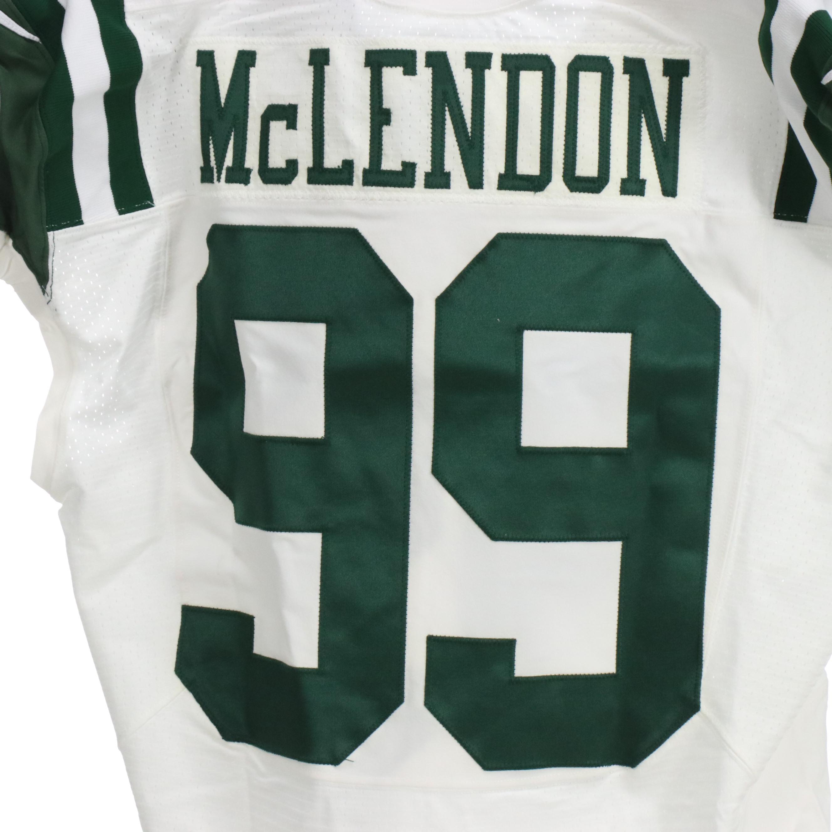 Steve McLendon with Other Player Issued New York Jets Nike Football Jerseys, PSA