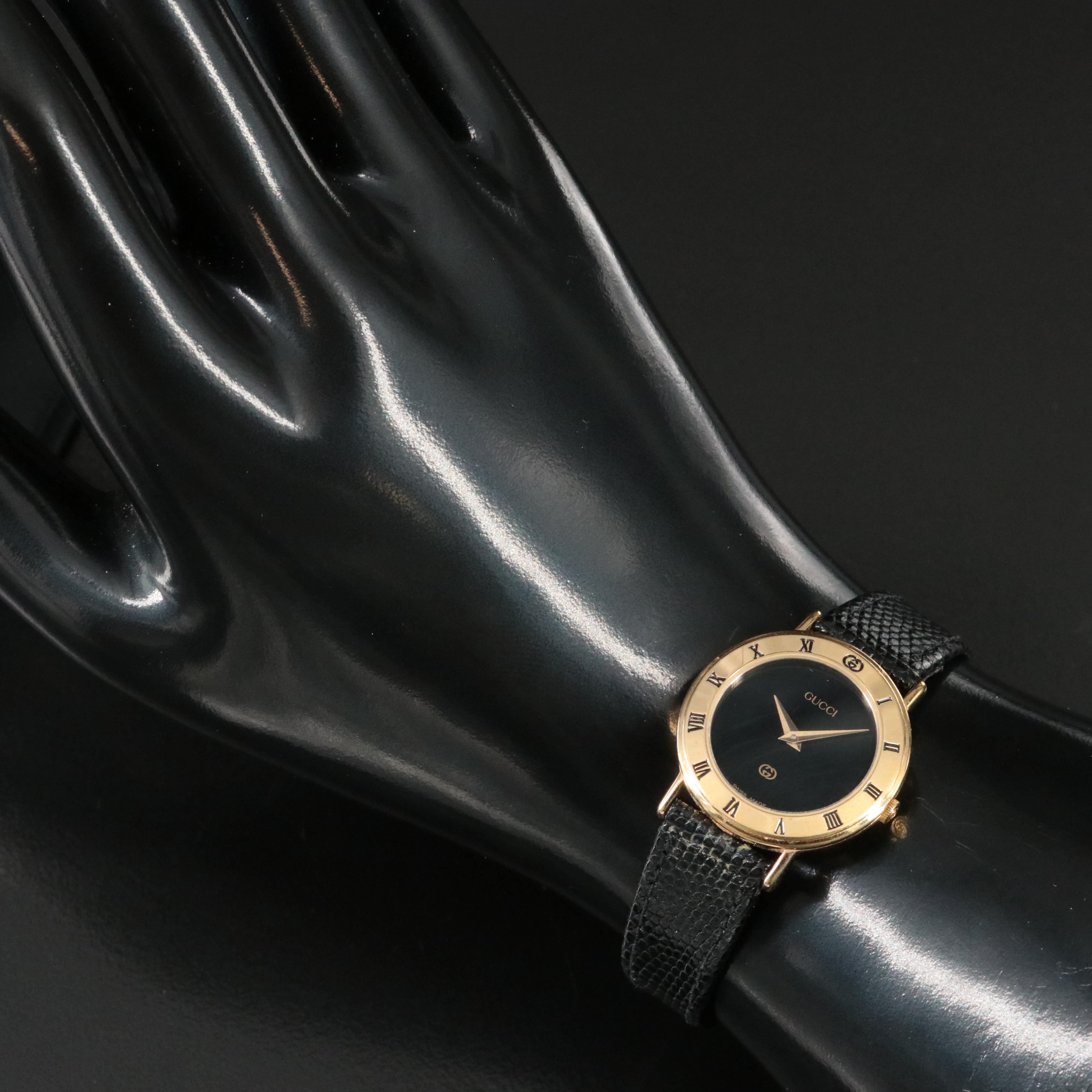 Classic Gucci Black Dial Gold Bezel Quartz Watch