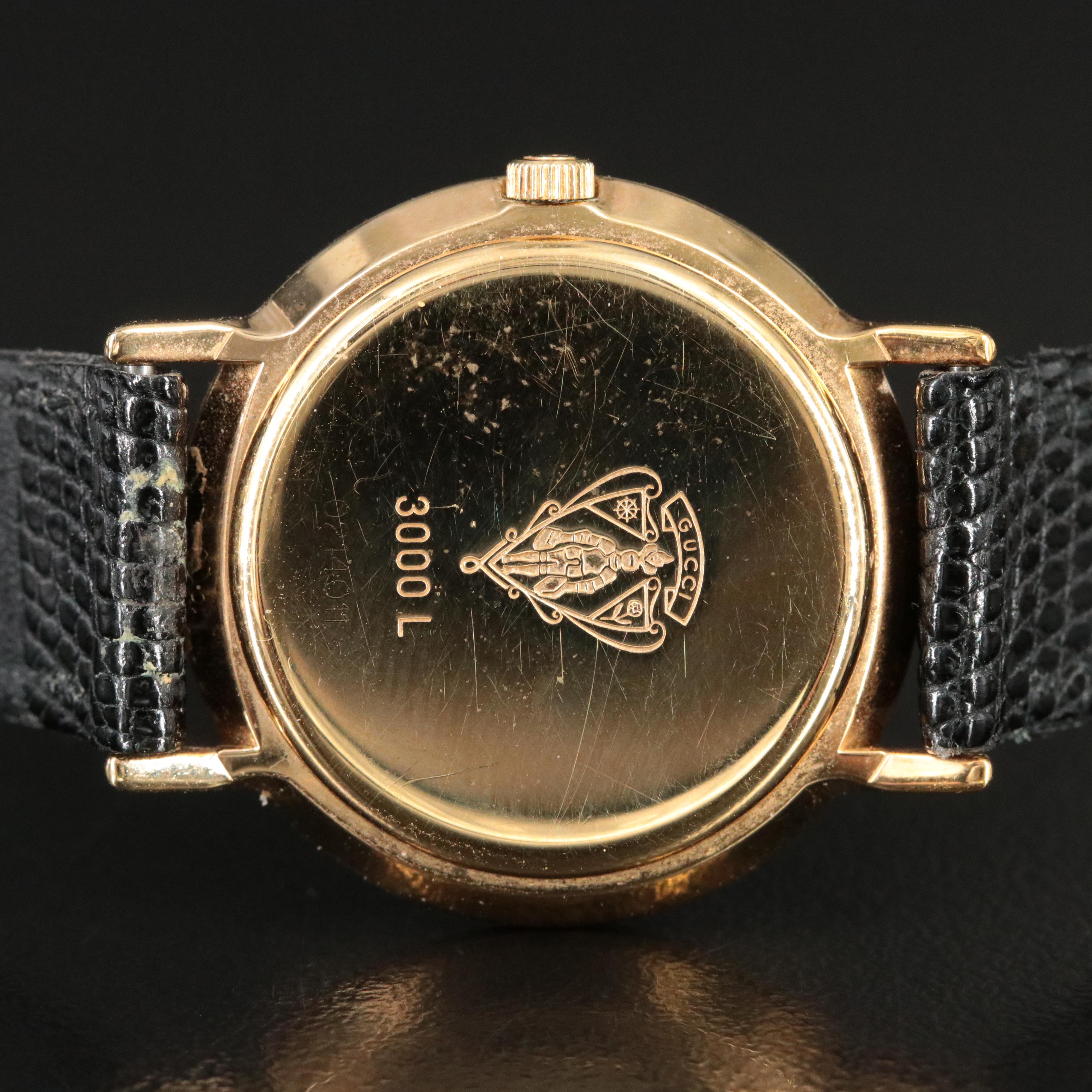 Classic Gucci Black Dial Gold Bezel Quartz Watch