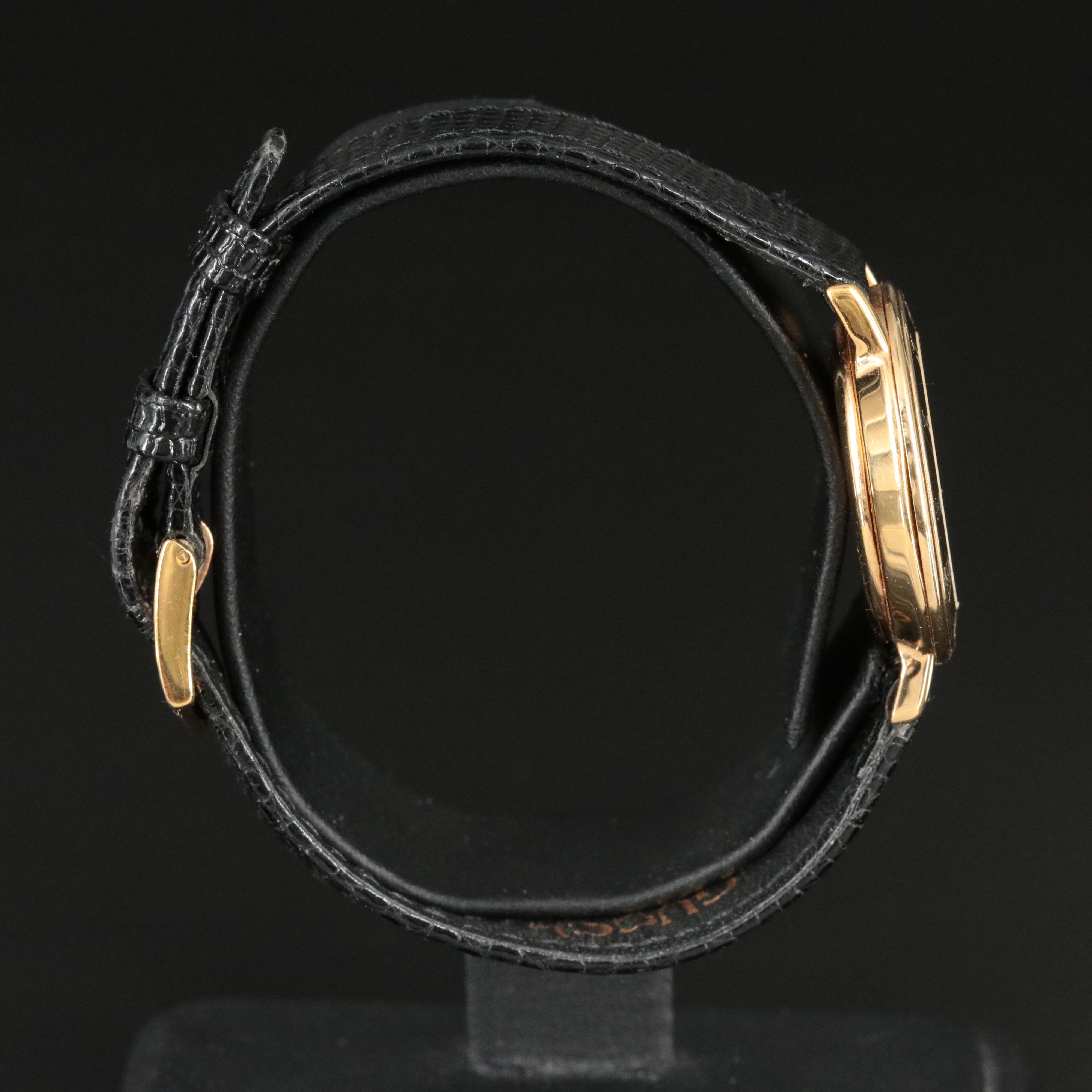 Classic Gucci Black Dial Gold Bezel Quartz Watch