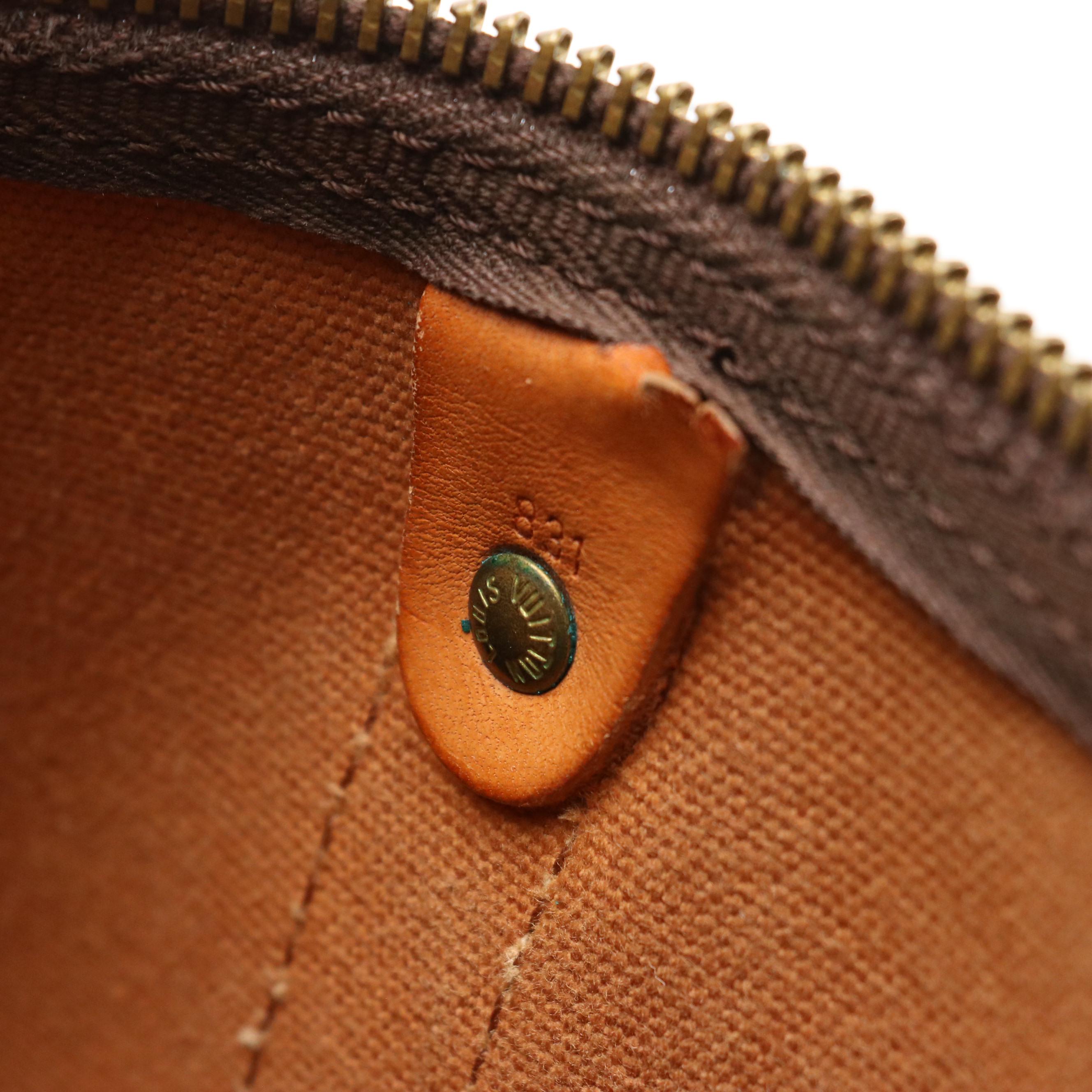 Louis Vuitton Keepall 50 Travel Bag in Monogram Canvas and Leather