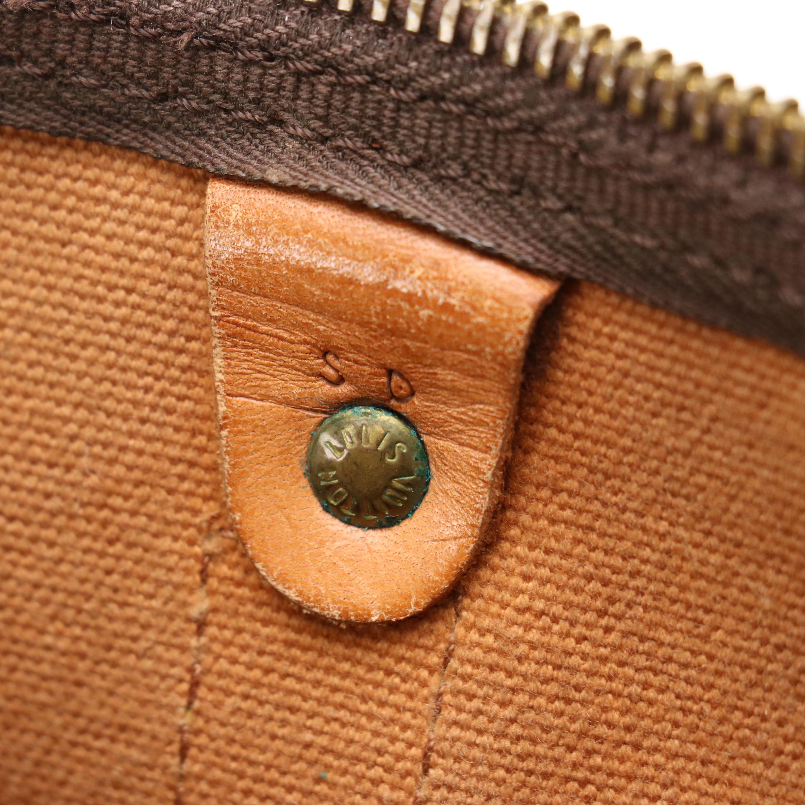 Louis Vuitton Keepall 50 Travel Bag in Monogram Canvas and Leather