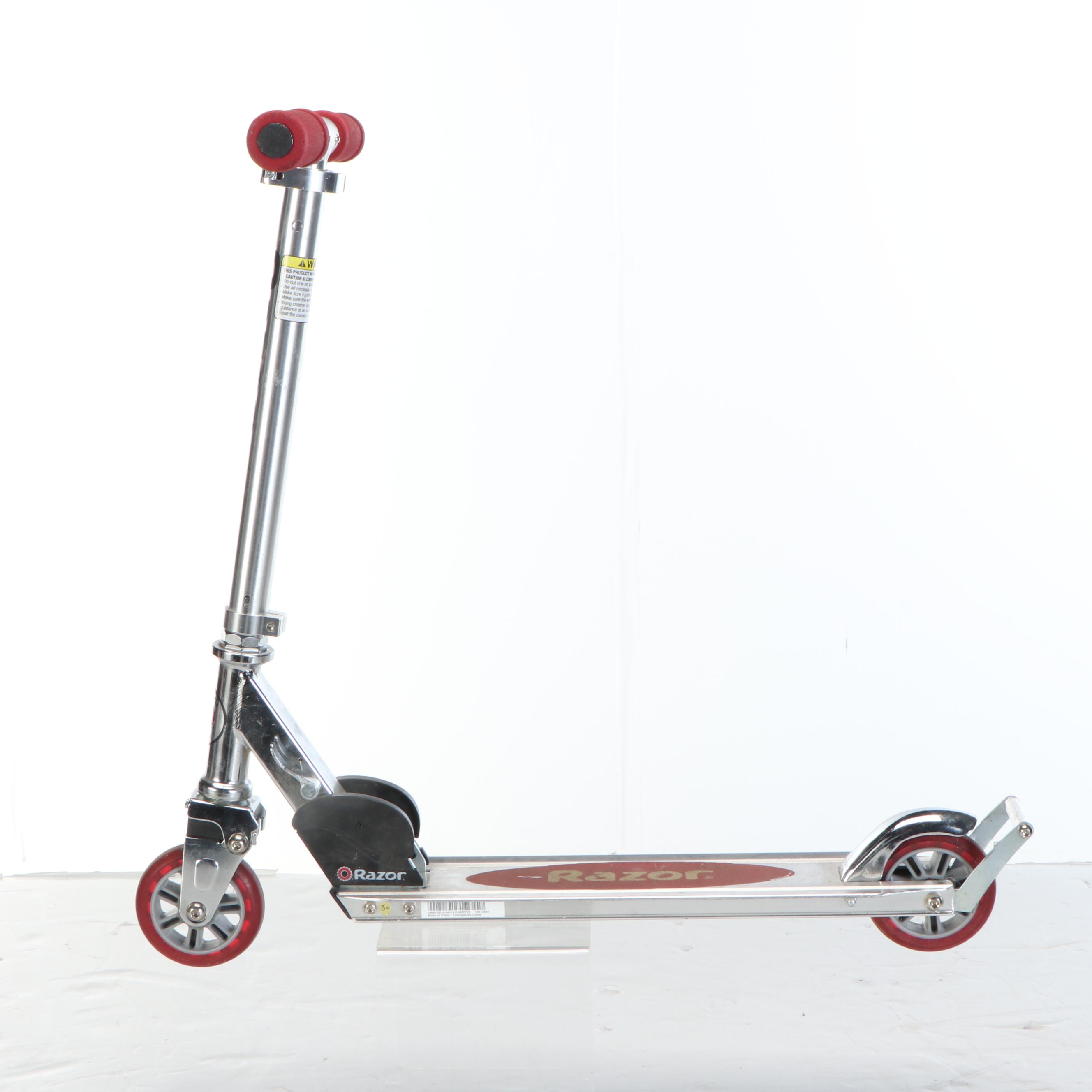 Razor Kick Scooter with The Heart Supply Skateboard and Padding