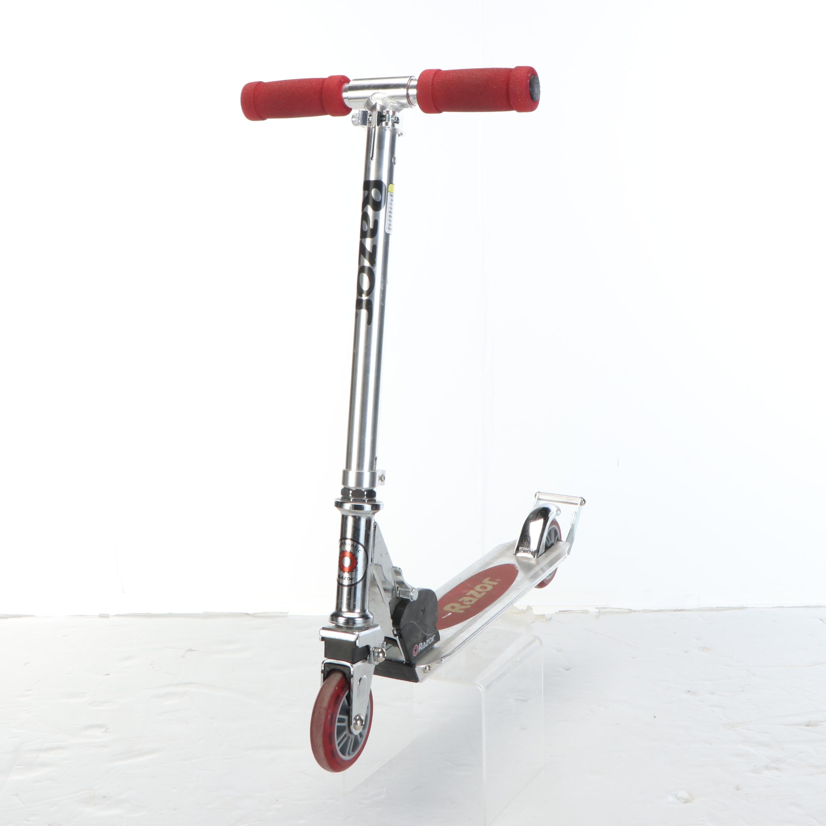 Razor Kick Scooter with The Heart Supply Skateboard and Padding