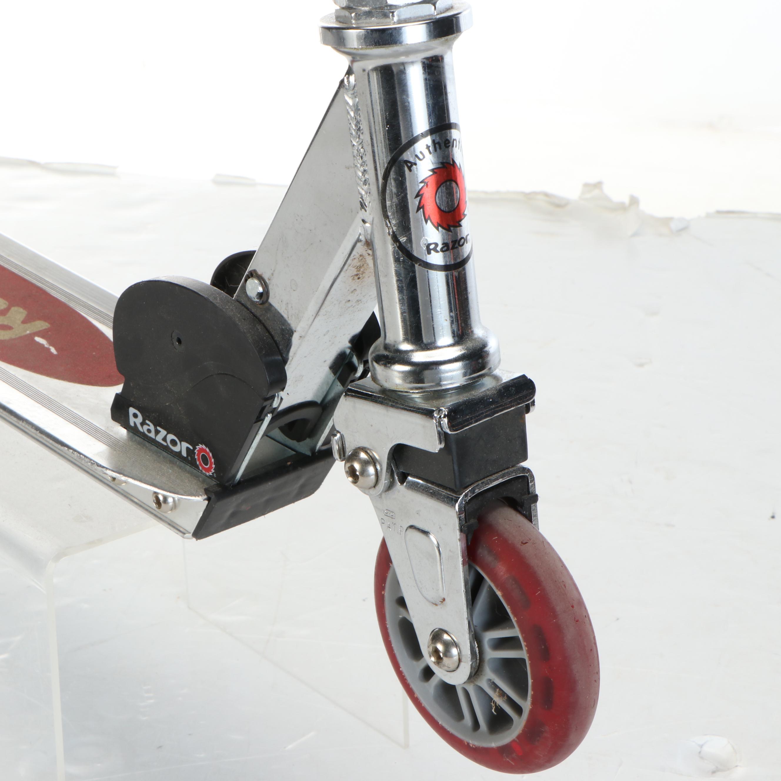 Razor Kick Scooter with The Heart Supply Skateboard and Padding