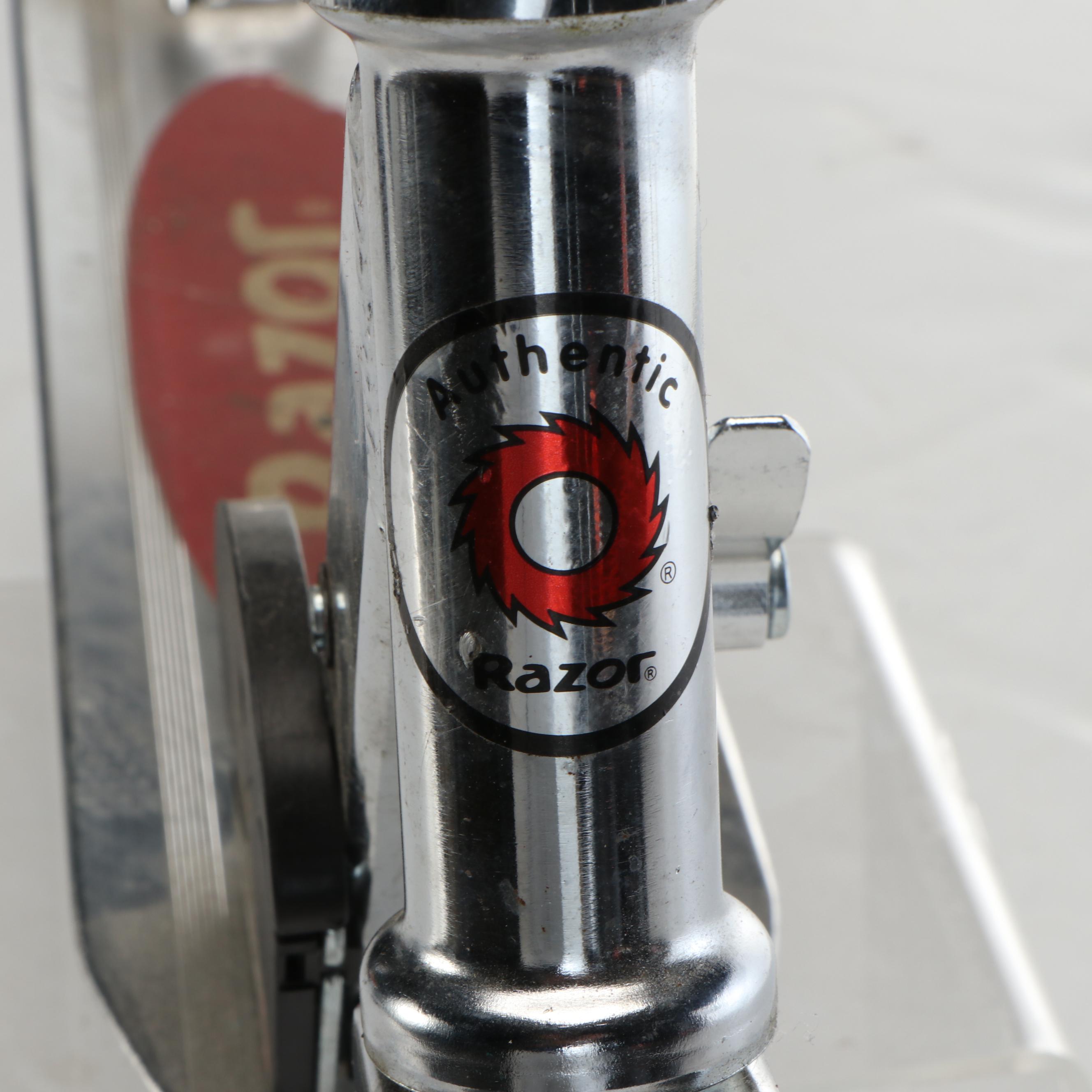 Razor Kick Scooter with The Heart Supply Skateboard and Padding