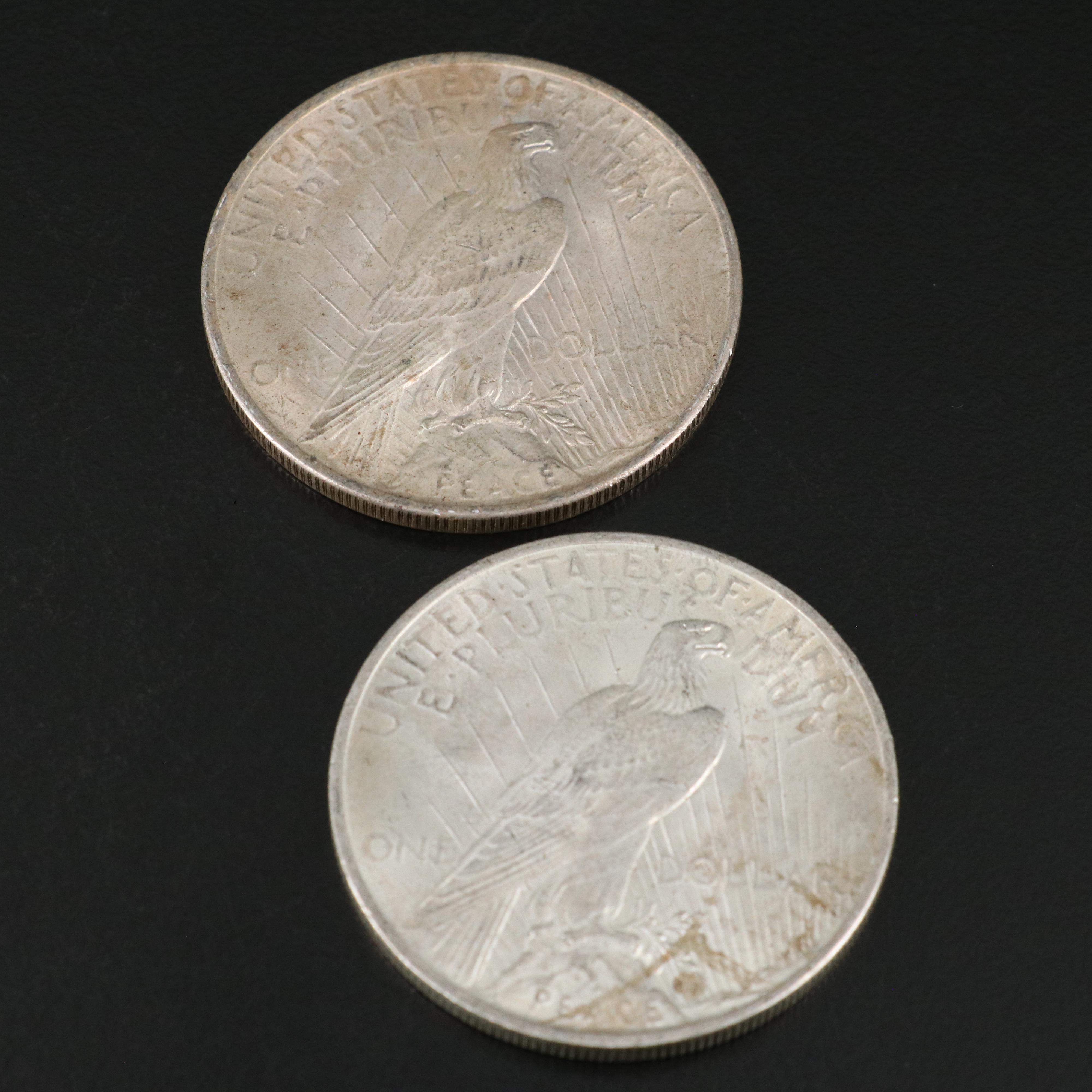 Seven U.S. Morgan and Peace Dollars