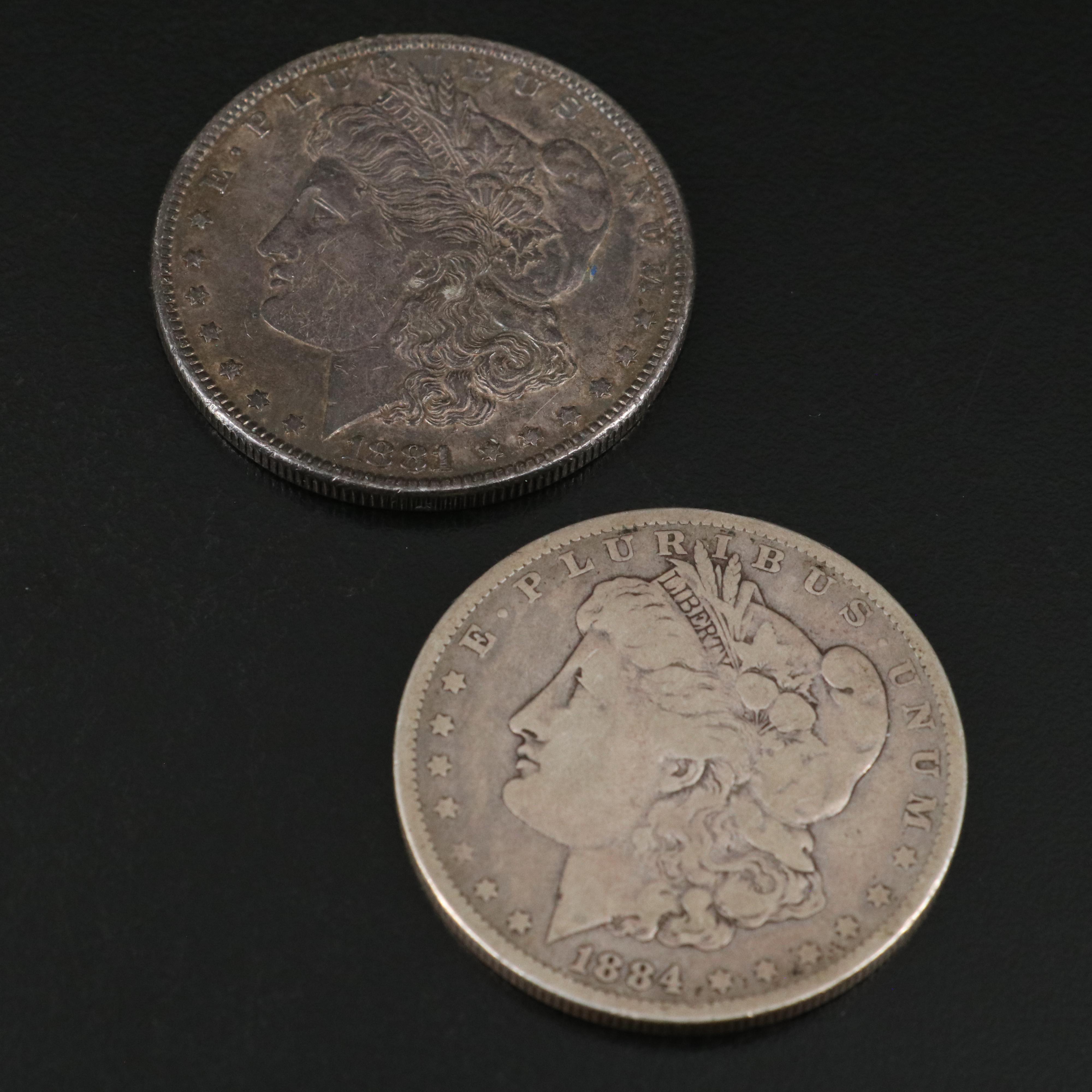 Seven U.S. Morgan and Peace Dollars