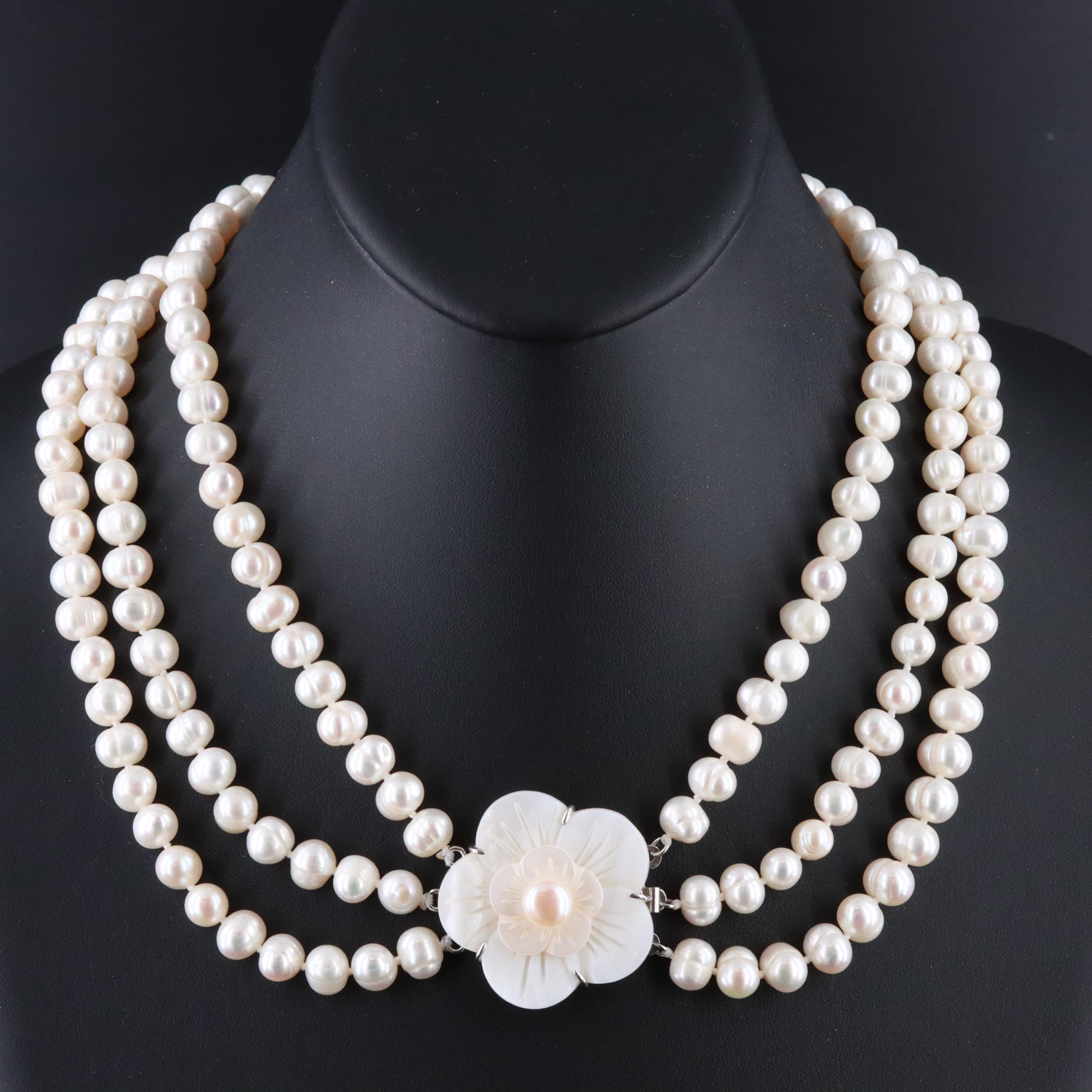 Tiered Multi-Strand Pearl Necklace with Flower Clasp