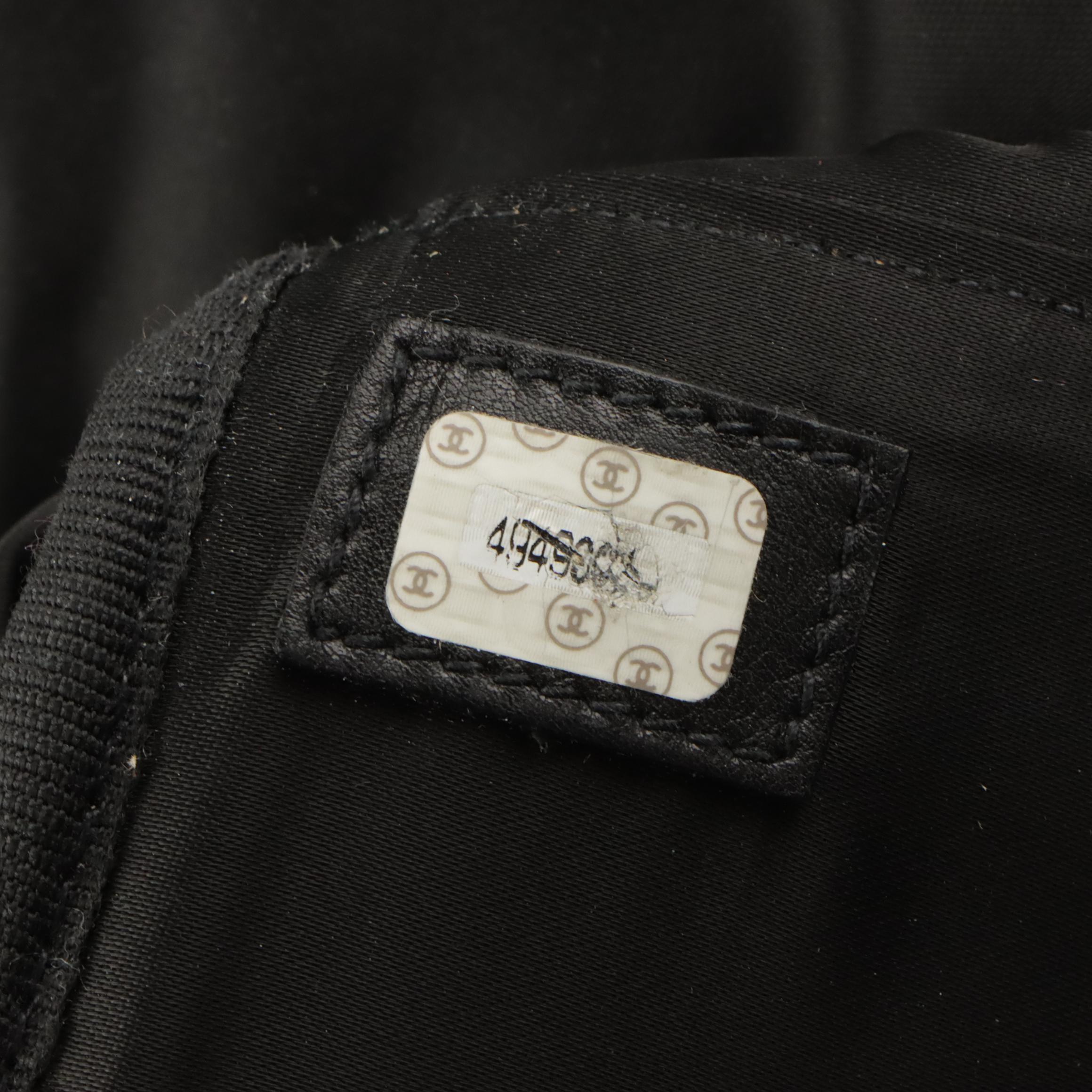 Chanel Two-Way Travel Duffle Bag in Black Diamond Stitched Lambskin Leather