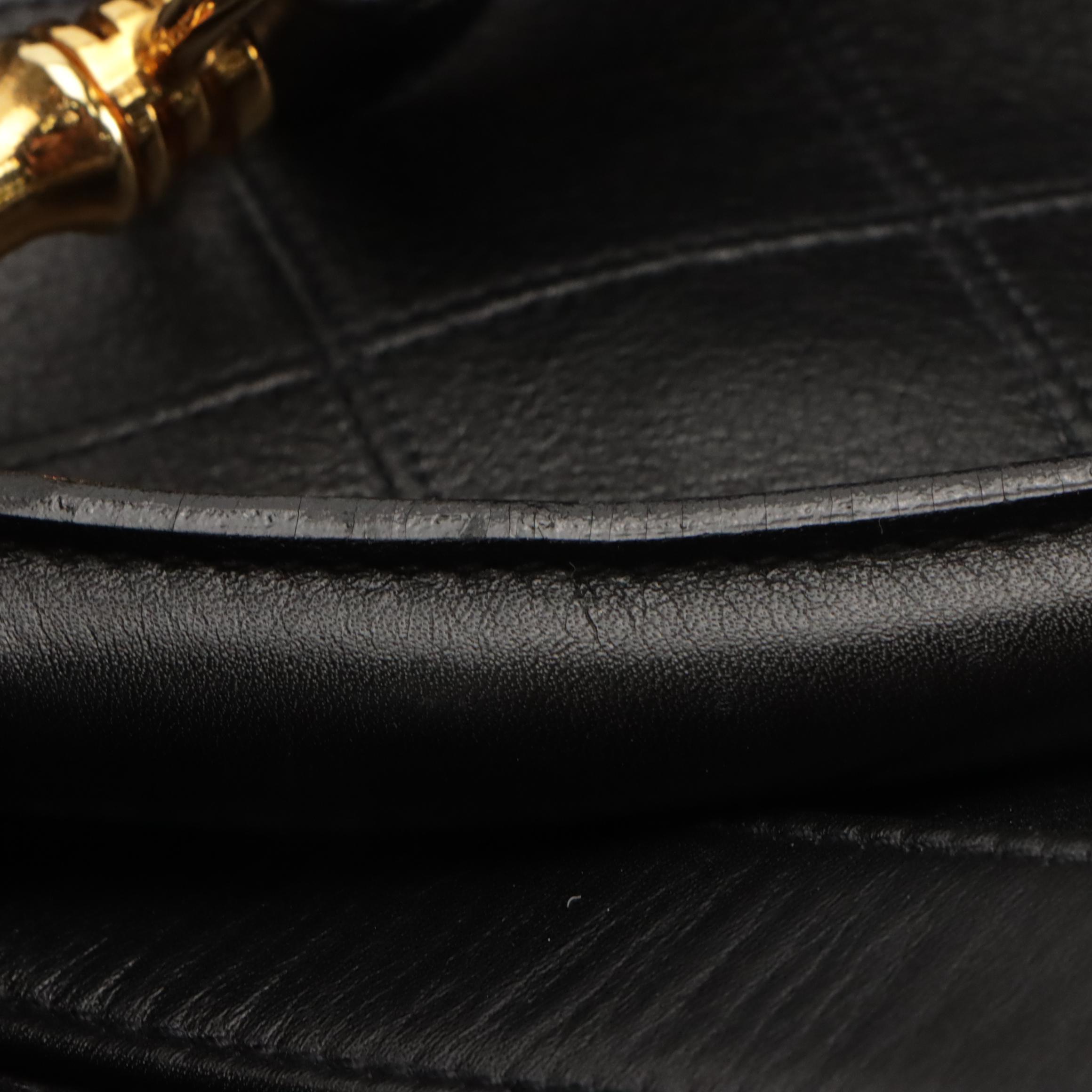 Chanel Two-Way Travel Duffle Bag in Black Diamond Stitched Lambskin Leather