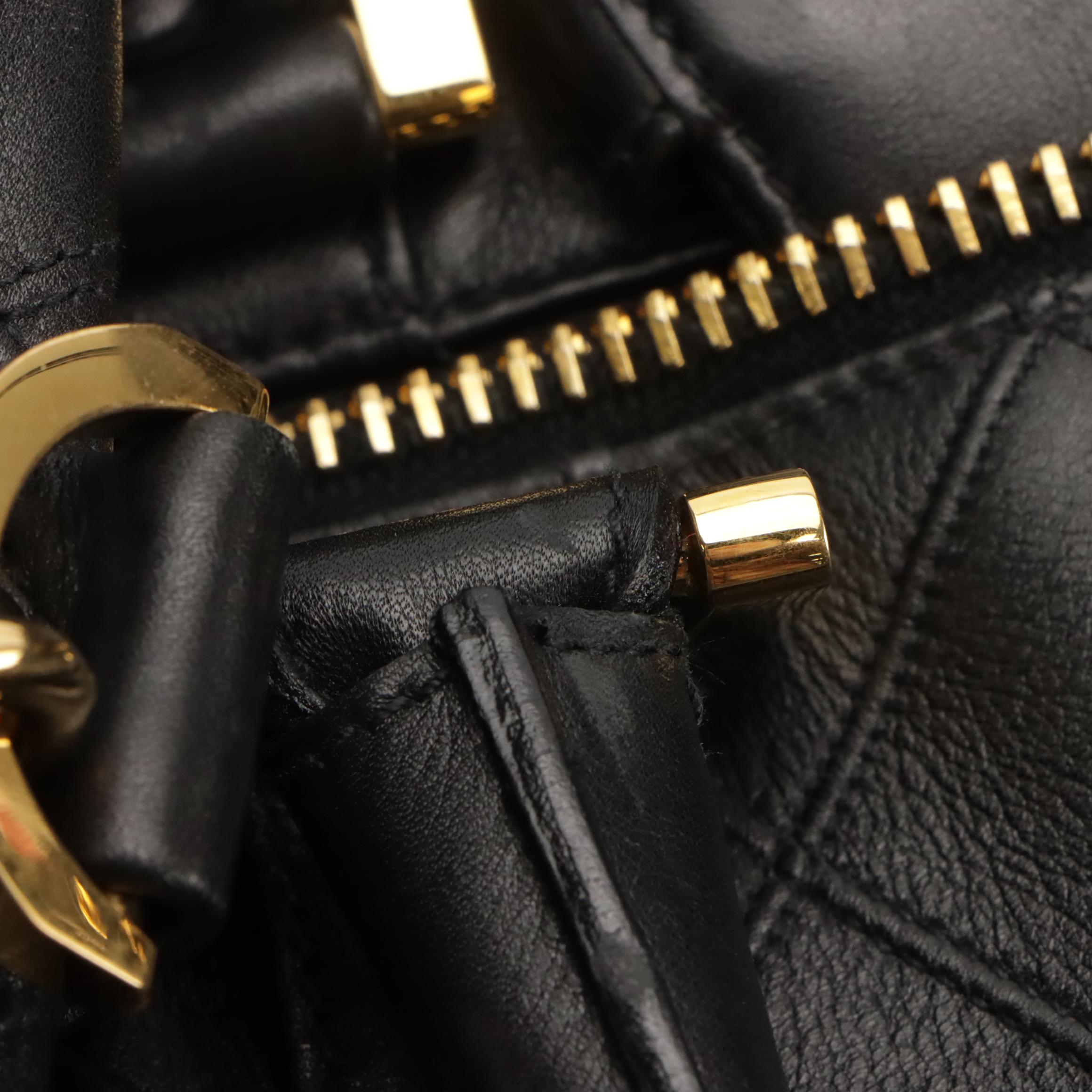 Chanel Two-Way Travel Duffle Bag in Black Diamond Stitched Lambskin Leather