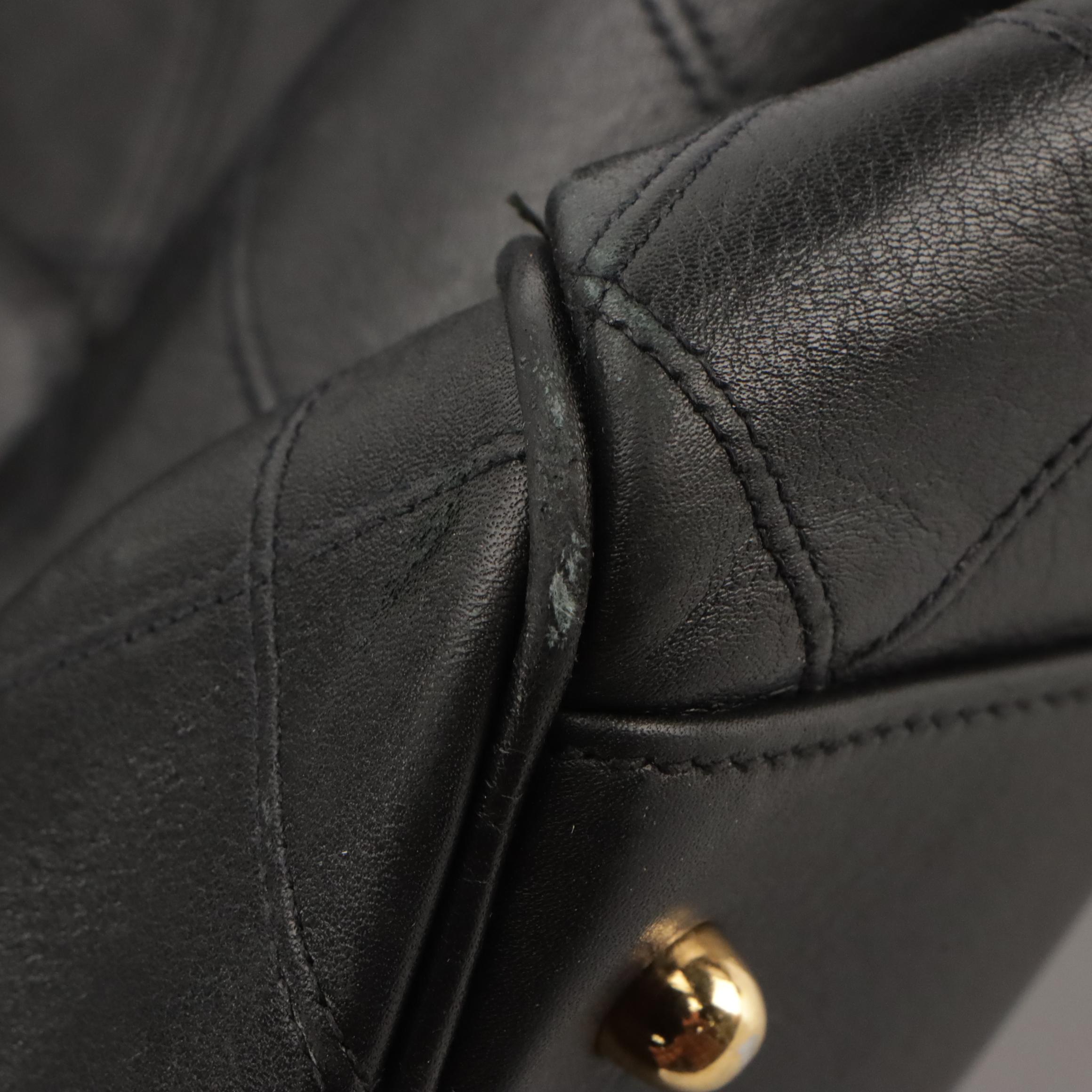 Chanel Two-Way Travel Duffle Bag in Black Diamond Stitched Lambskin Leather