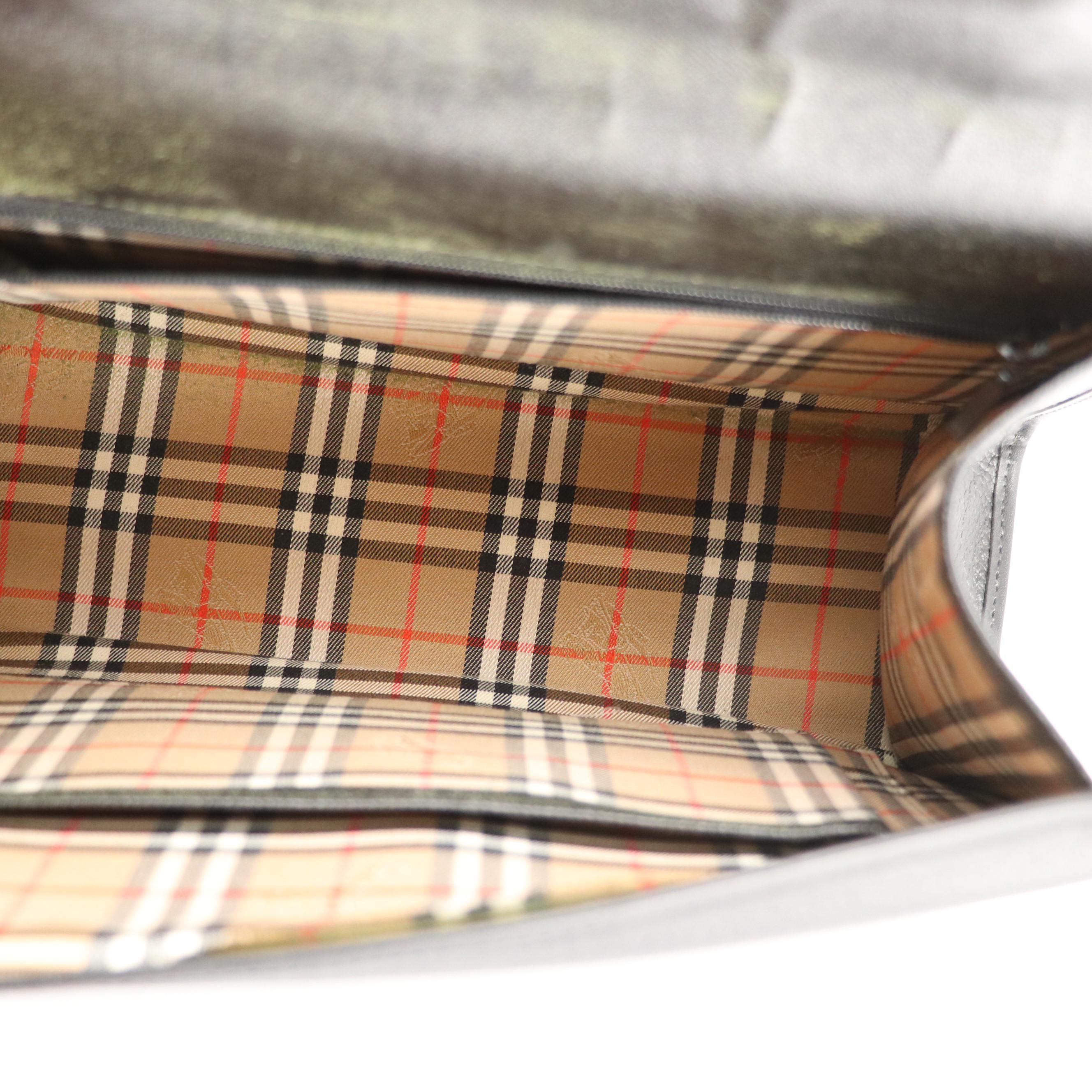 Burberrys Black Grained Leather Top Handle Bag