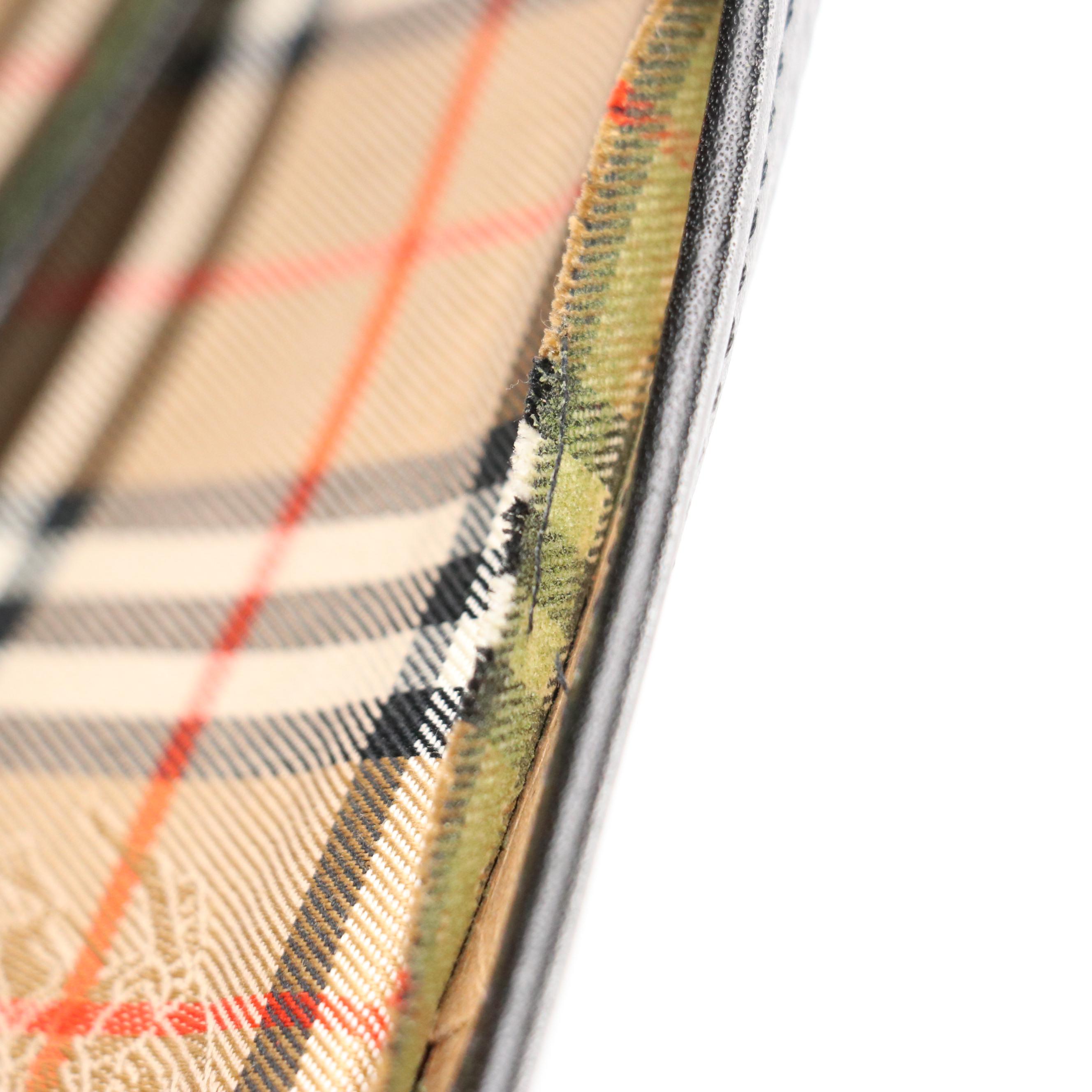 Burberrys Black Grained Leather Top Handle Bag