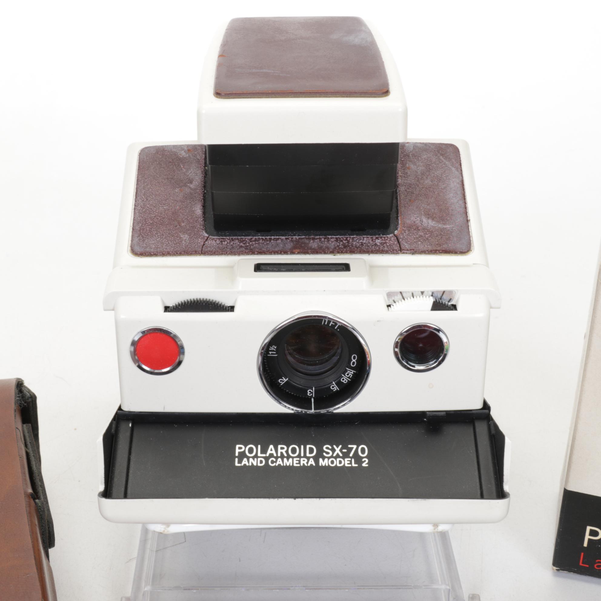 Polaroid SX-70 Camera with Radio & Cassette Players