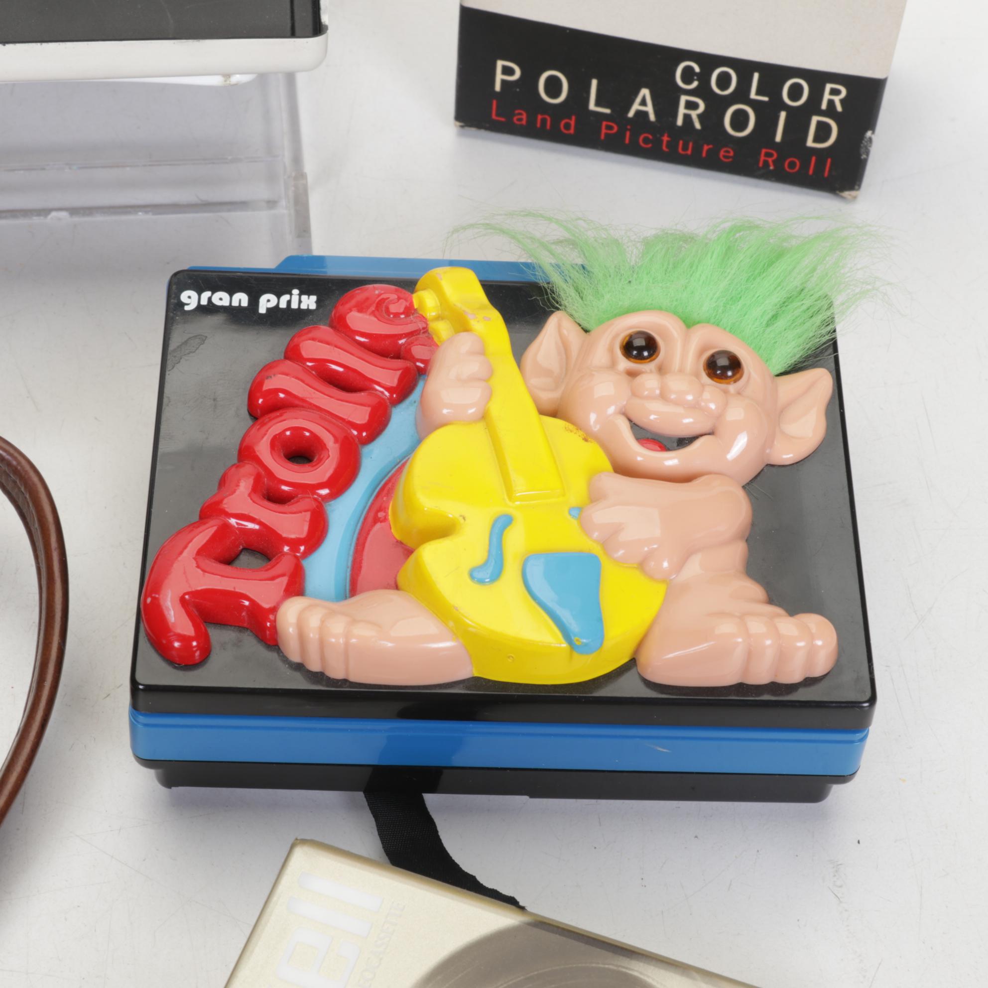 Polaroid SX-70 Camera with Radio & Cassette Players