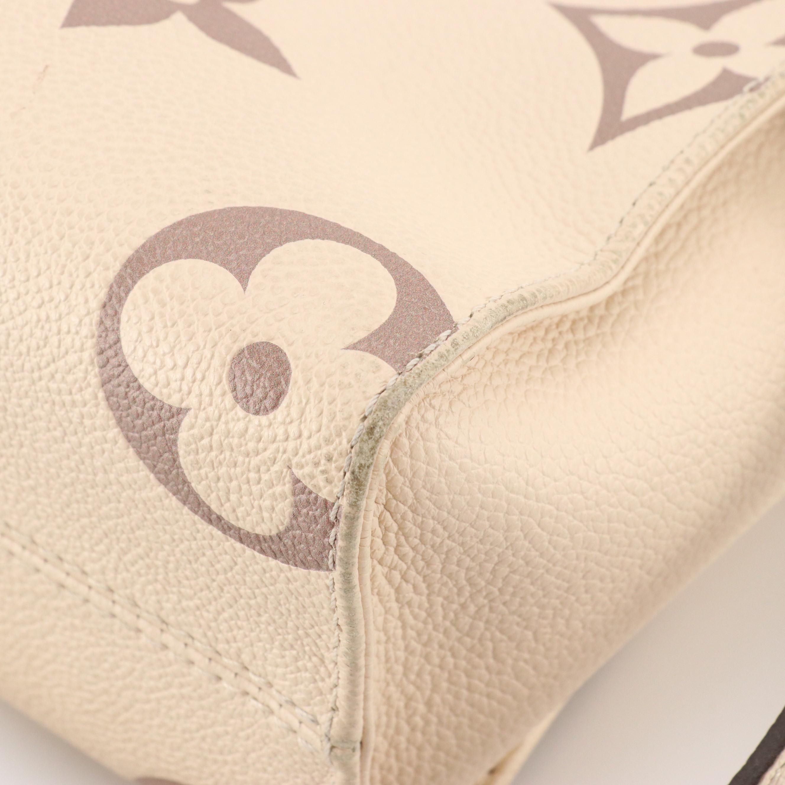 Louis Vuitton OnTheGo PM Two-Way Tote in Dove & Cream Monogram Empreinte Leather