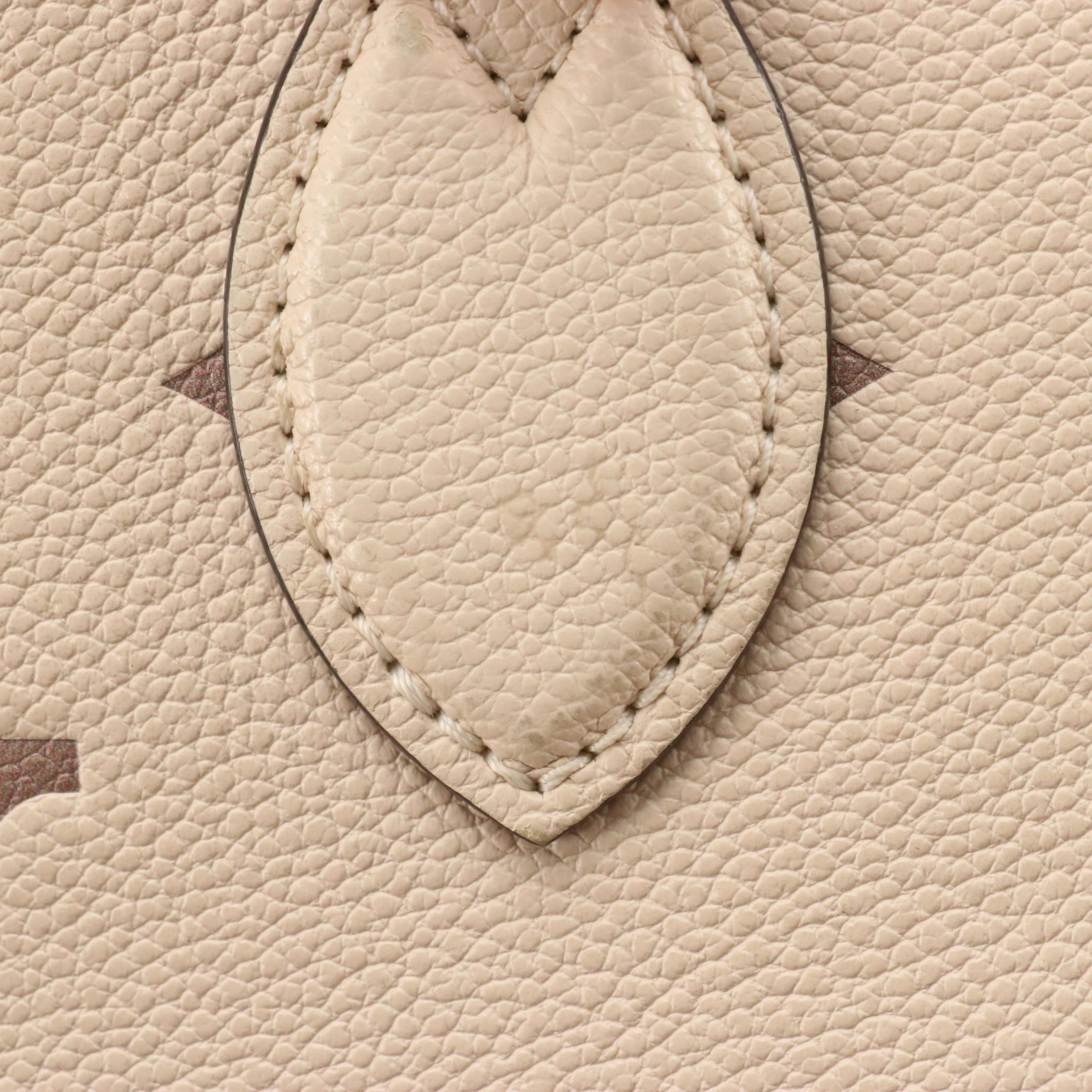 Louis Vuitton OnTheGo PM Two-Way Tote in Dove & Cream Monogram Empreinte Leather